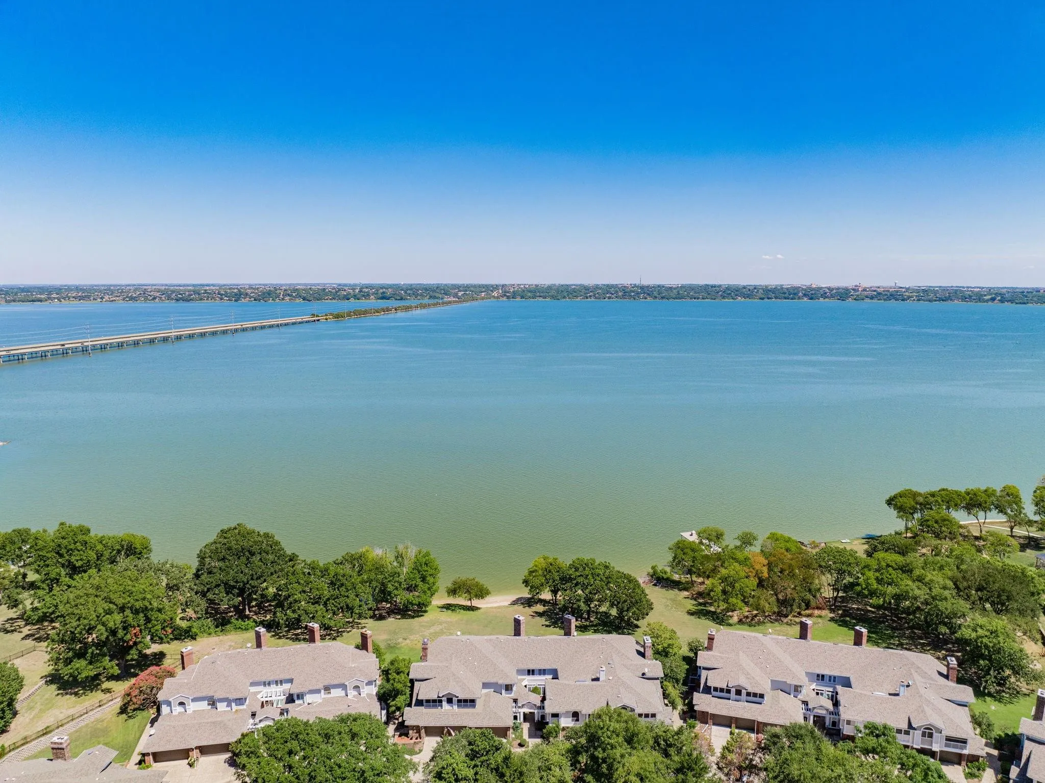 Aerial view of residential area with a large body of water