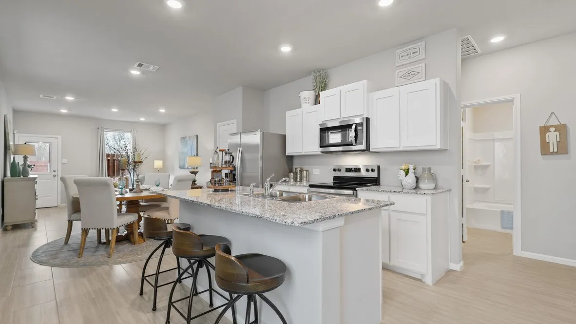 Kitchen - All Home and community information, including pricing, included features, terms, availability and amenities, are subject to change at any time without notice or obligation. All Drawings, pictures, photographs, video, square footages, floor plans, elevations, features, colors and sizes are approximate for illustration purposes only and will vary from the homes as built.

