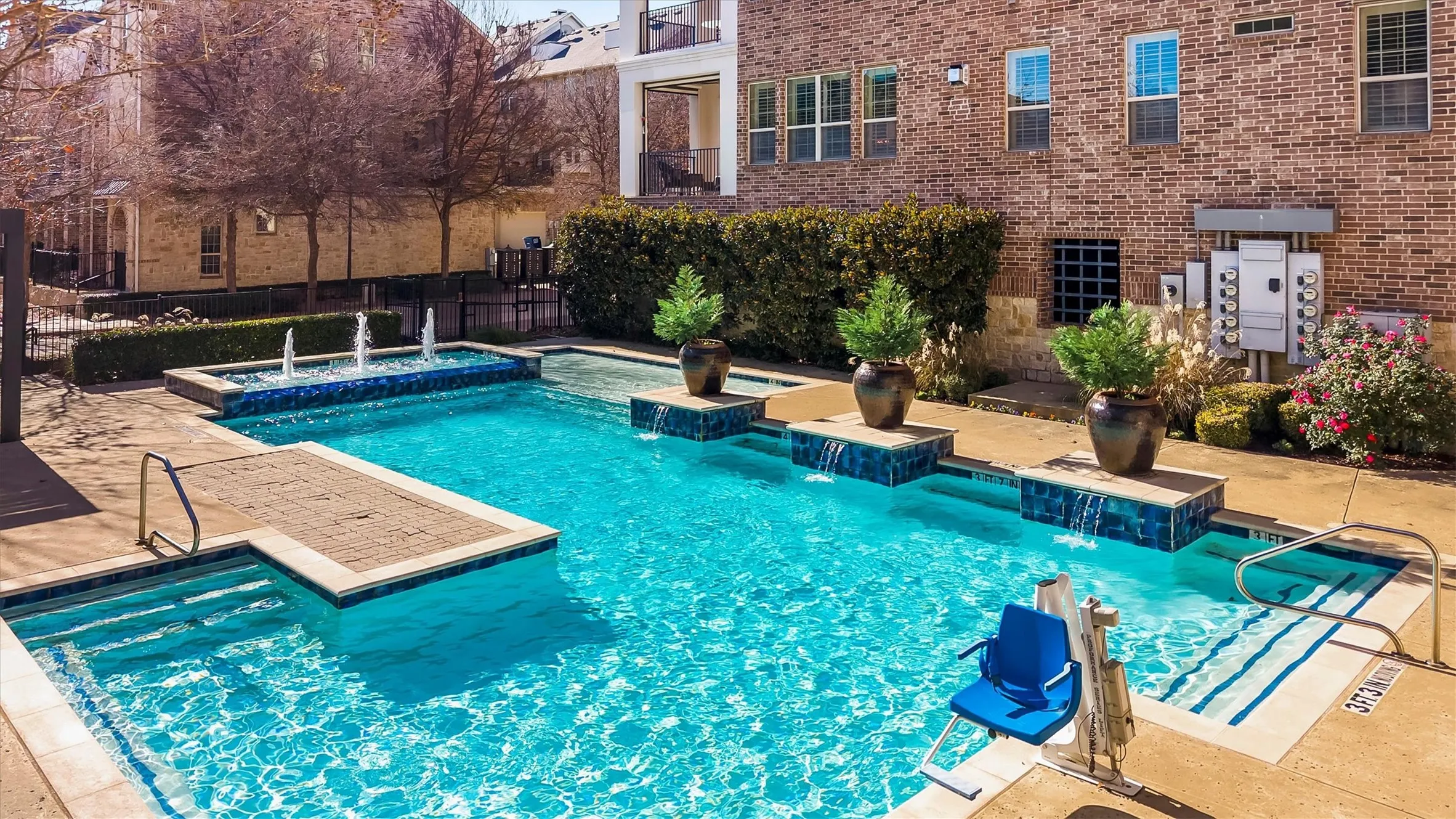 View of pool featuring a patio area and a pool with connected hot tub