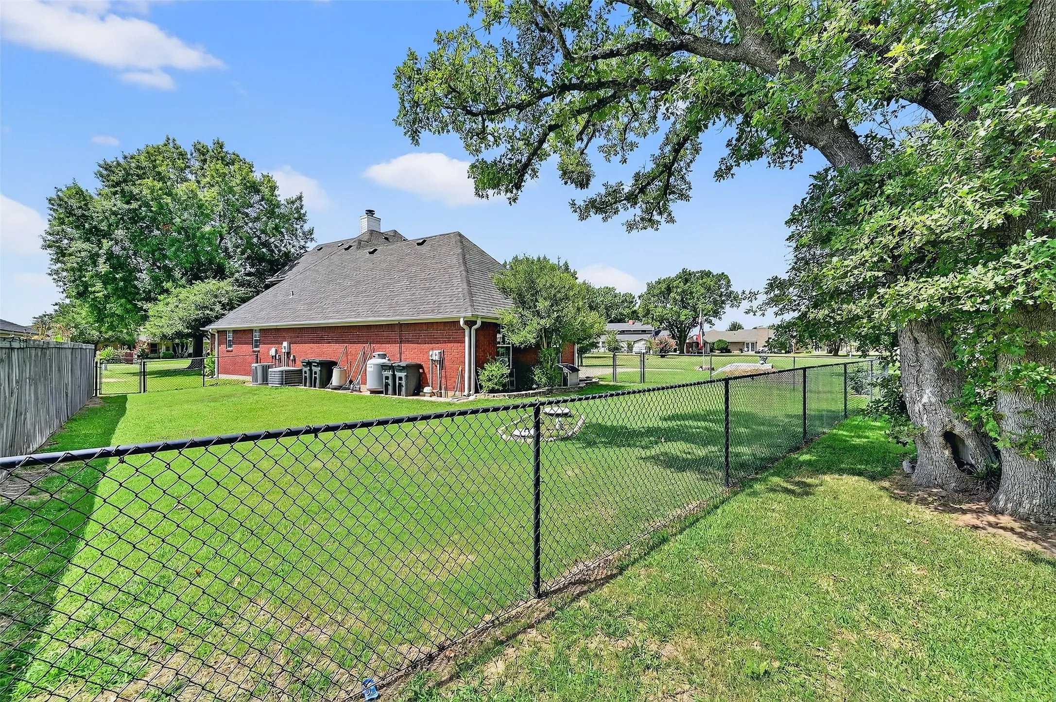 View of fenced backyard