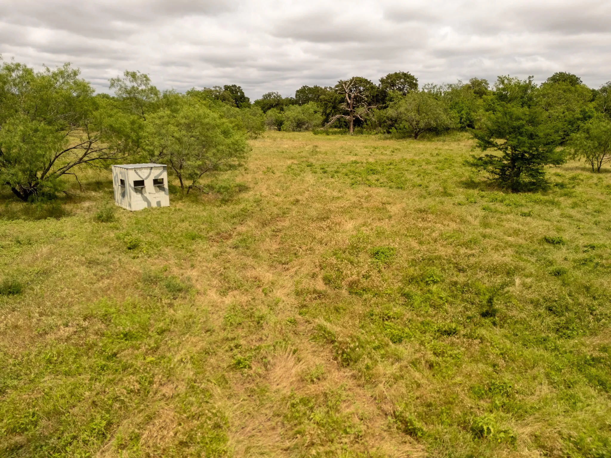 View of yard featuring an outbuilding and a view of countryside