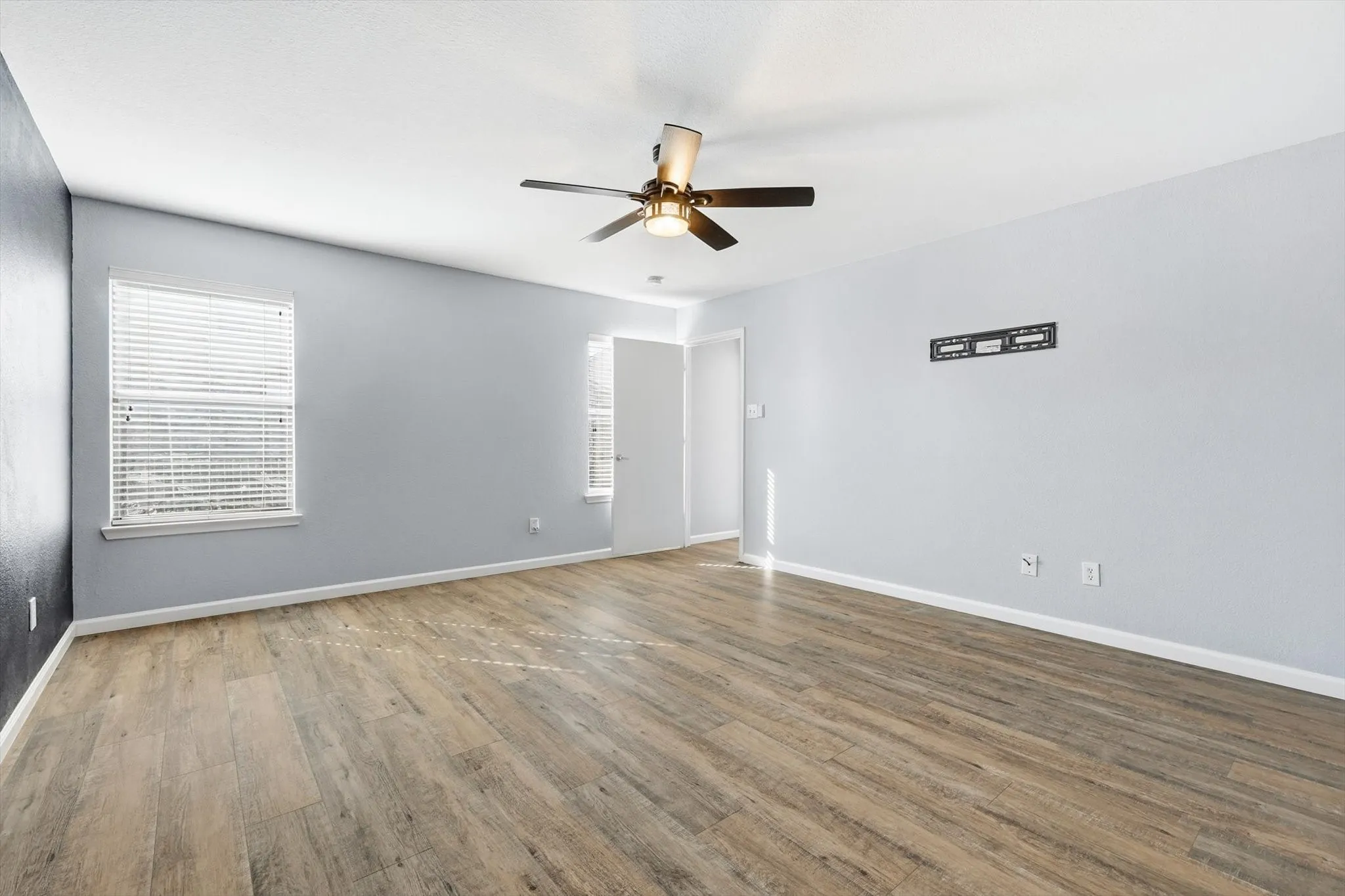 Unfurnished room featuring wood finished floors