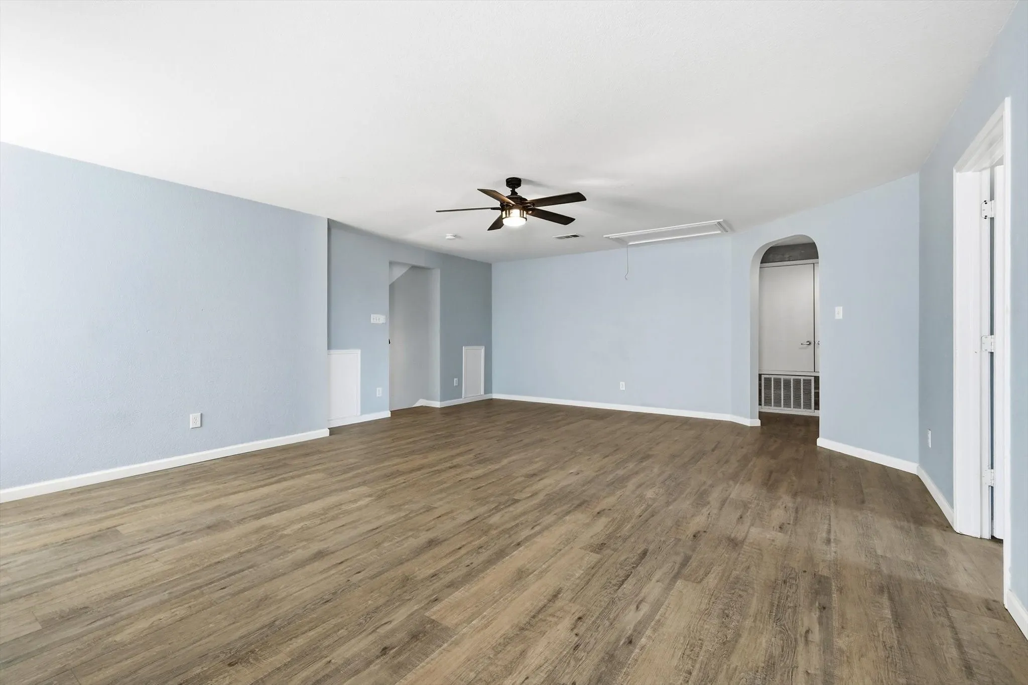 Unfurnished room featuring wood finished floors