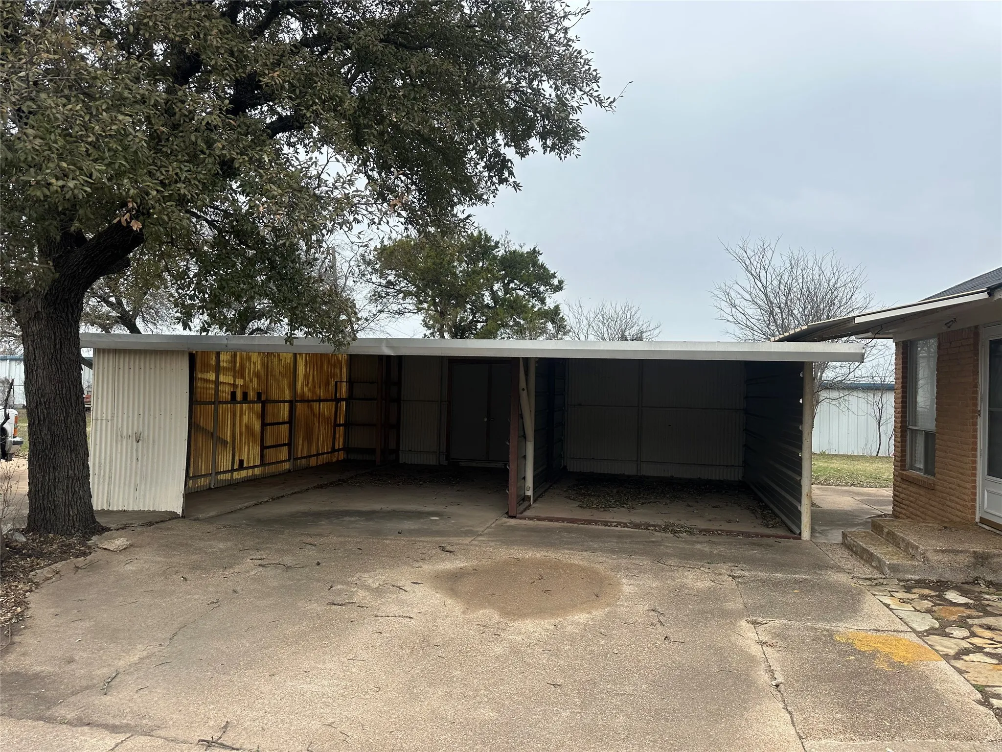 View of vehicle parking featuring driveway