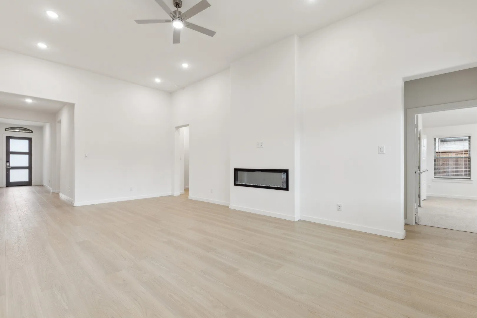 Living Room in the Gilmour II home plan by Trophy Signature Homes – REPRESENTATIVE PHOTO