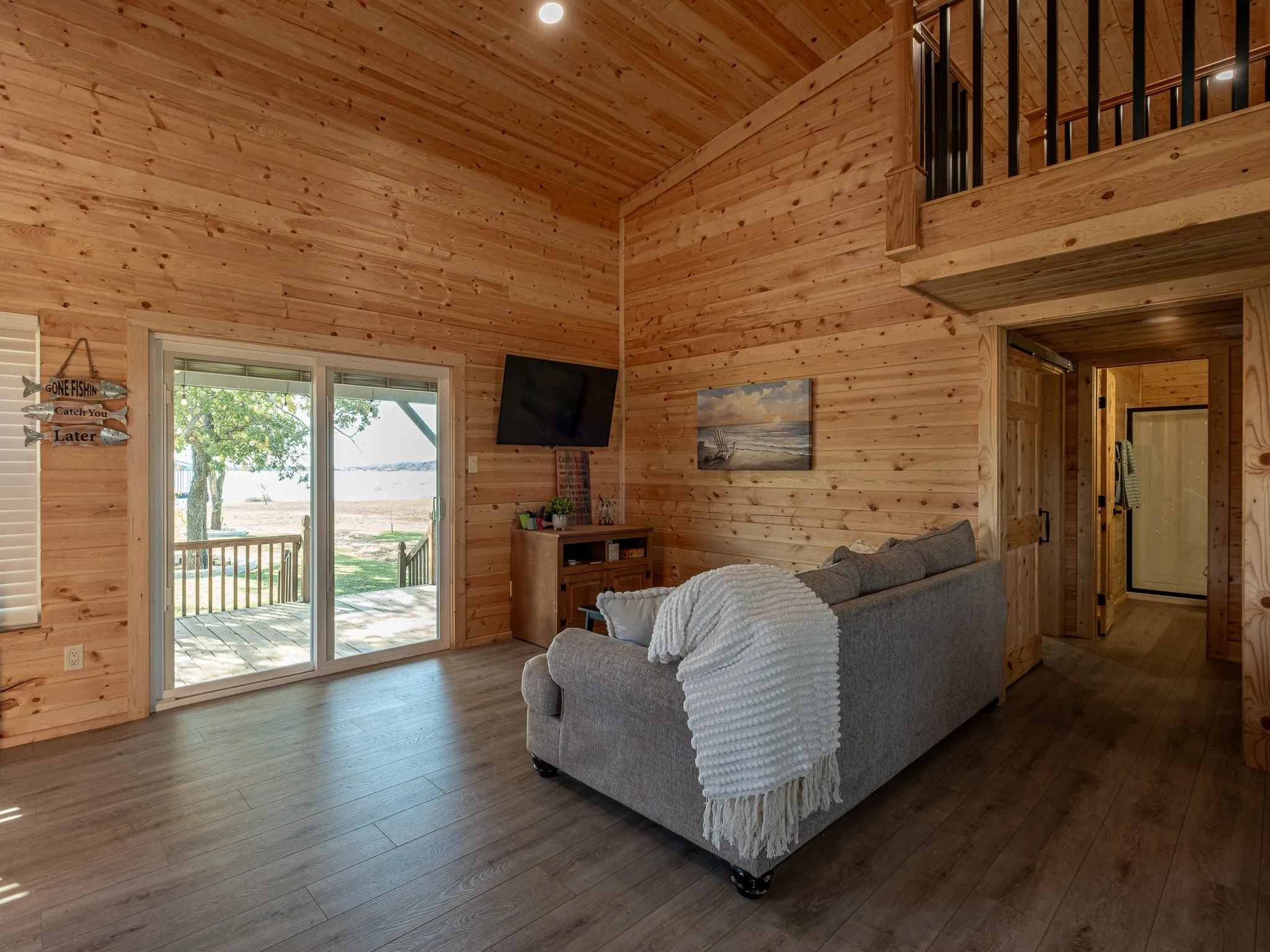 Charming Lakefront Cabin located on Lake leon complete with 3 RV Hookups, private boat ramp, dock, and 3 full bedrooms! #lakeleon #lakefront #lakeliving #waterfront #airbnb #incomeproducing #lakecabin