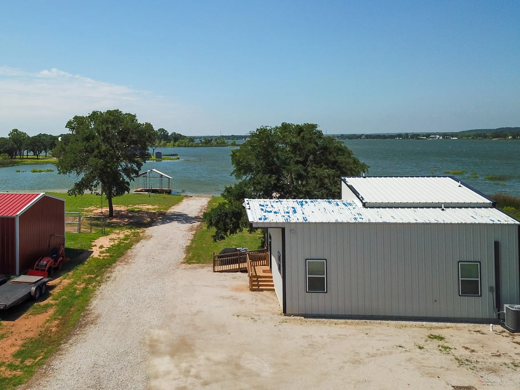 Invite all of your friends!! Ample parking for all of your lake guests and weekend visitors! Three RV Hookups!