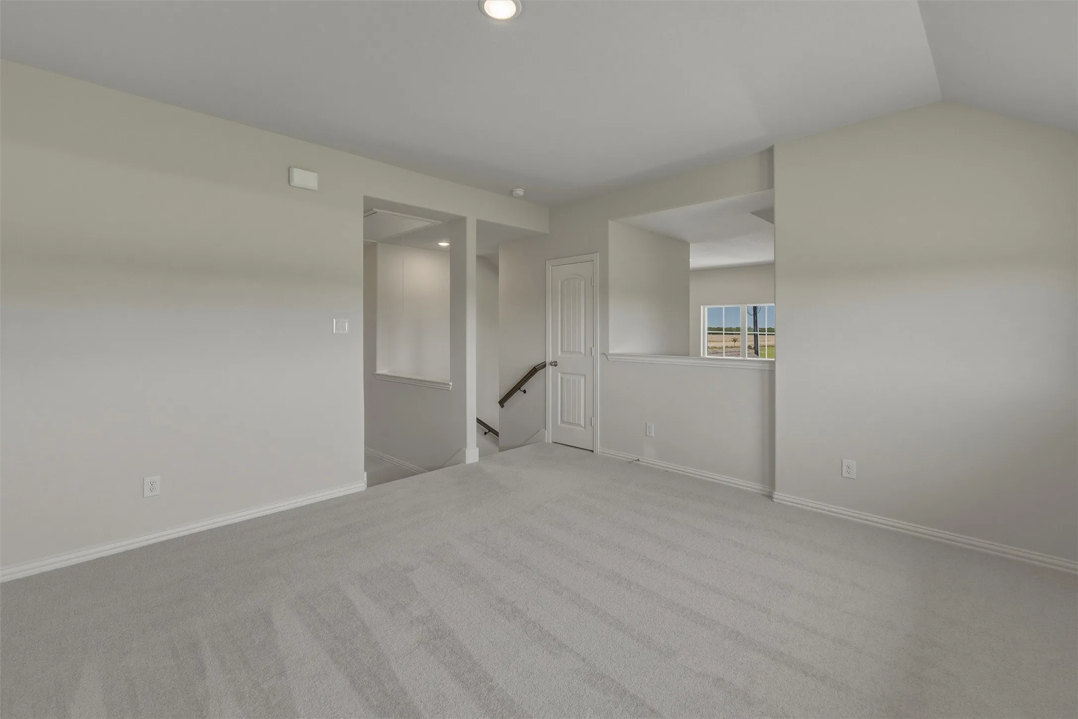 Carpeted room featuring recessed lighting and neutral wall tones