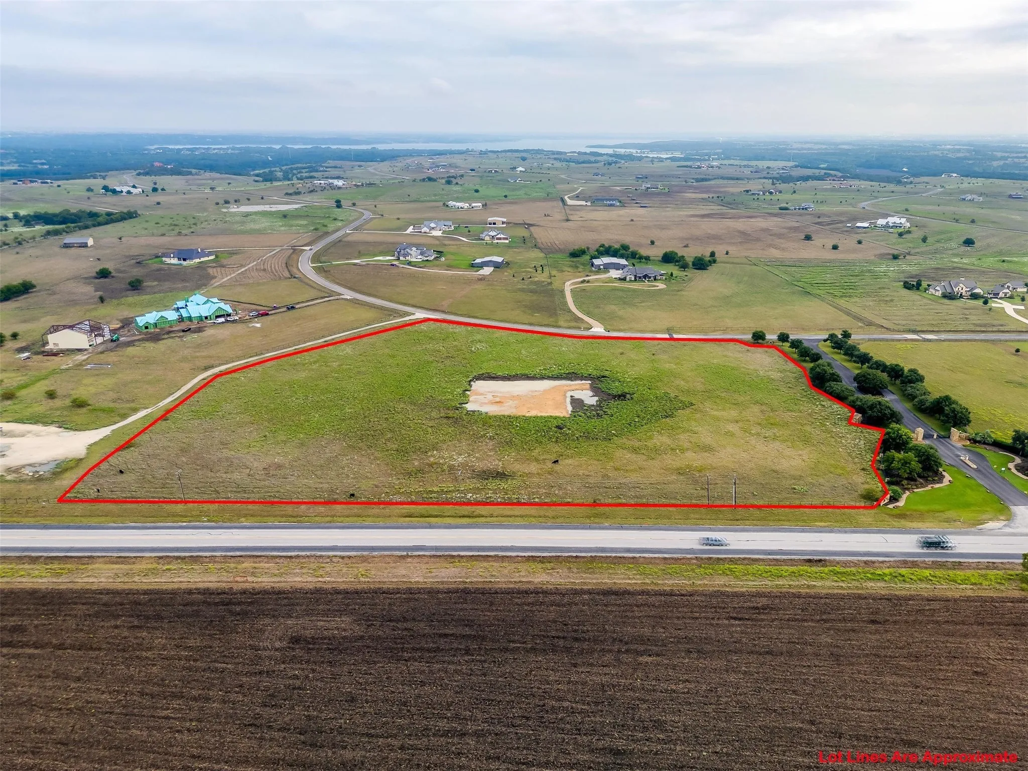 Aerial from Hwy 1187 which fronts the property