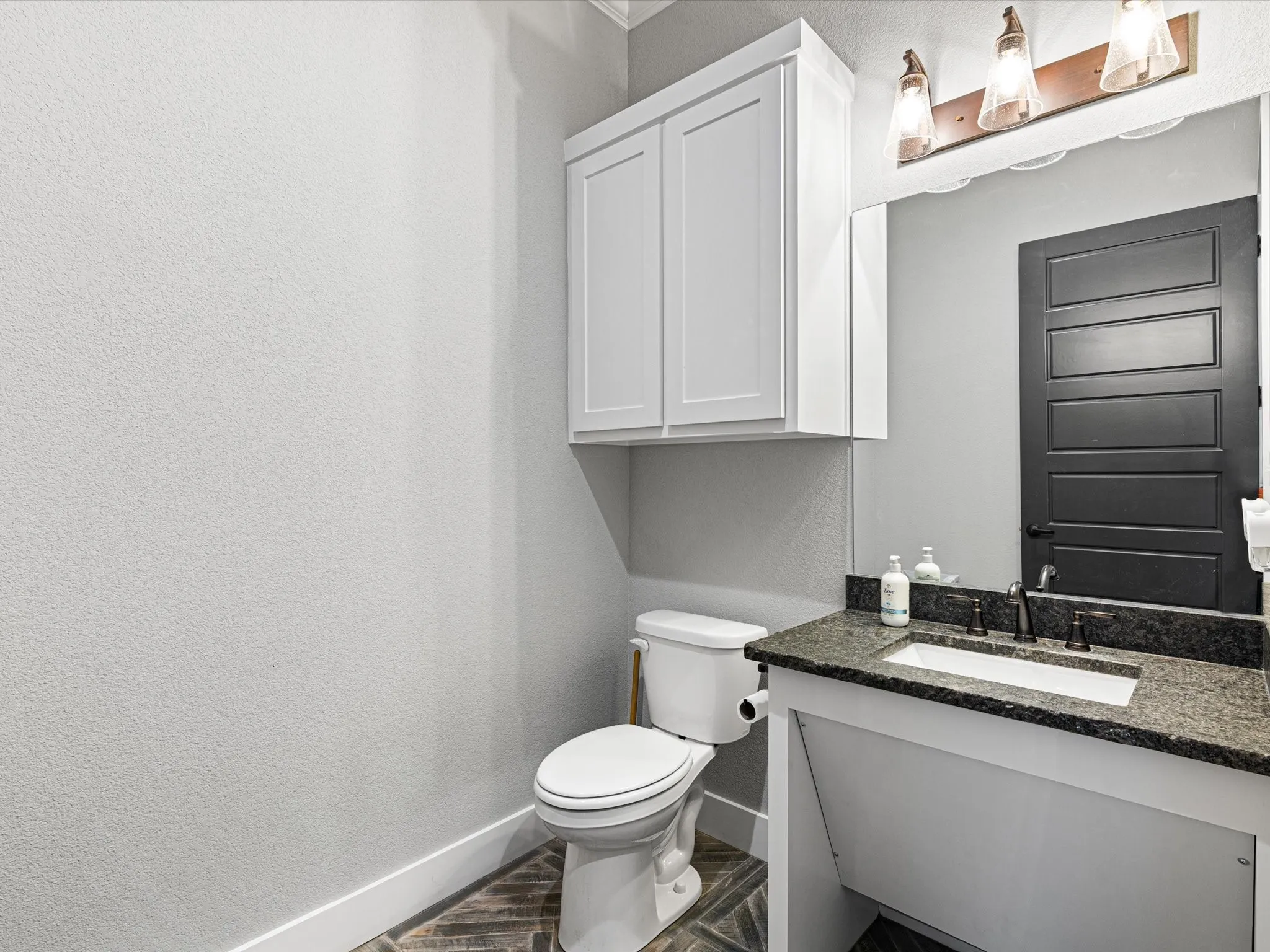 Bathroom with baseboards and vanity