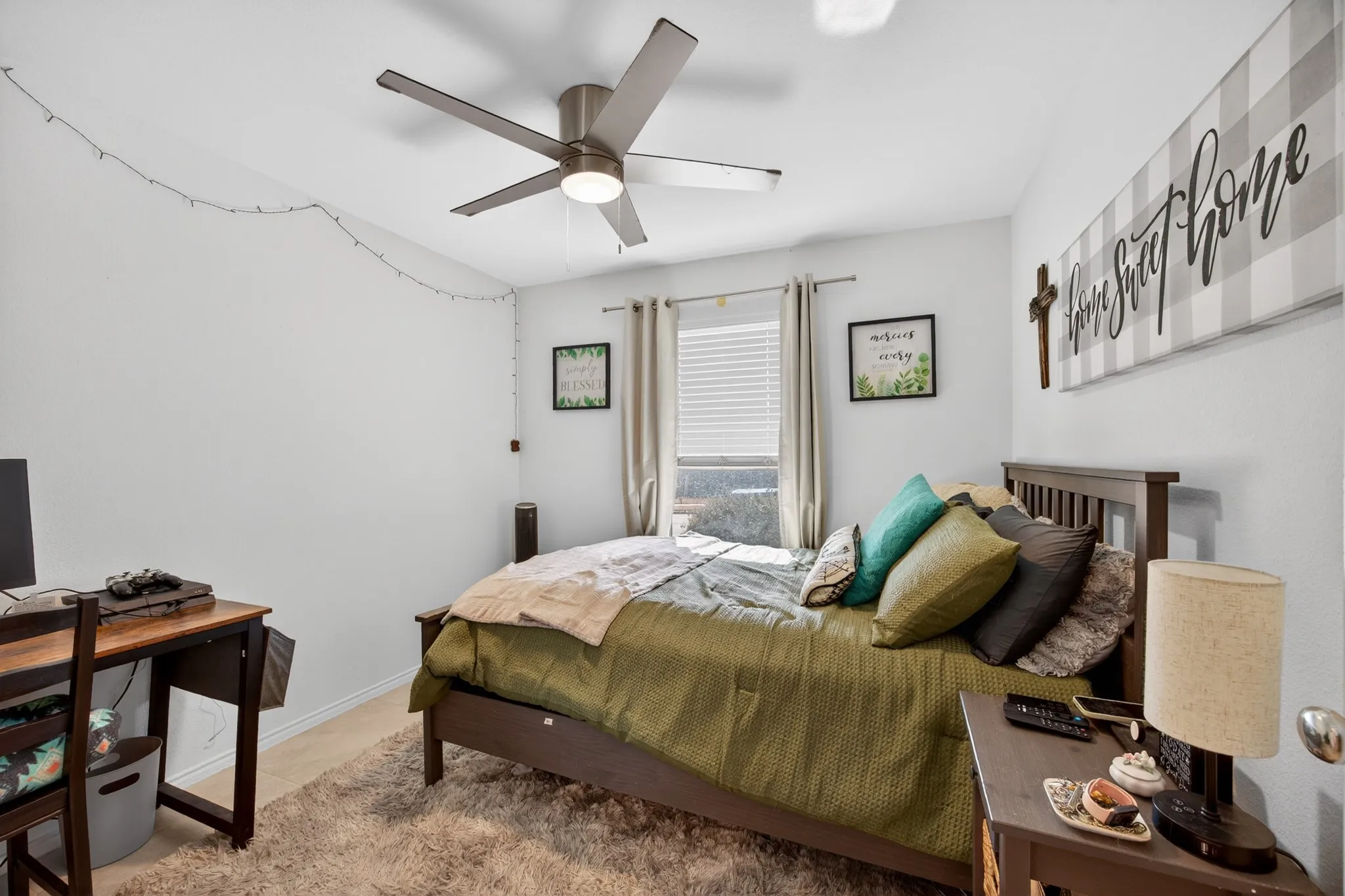 Bedroom featuring a ceiling fan