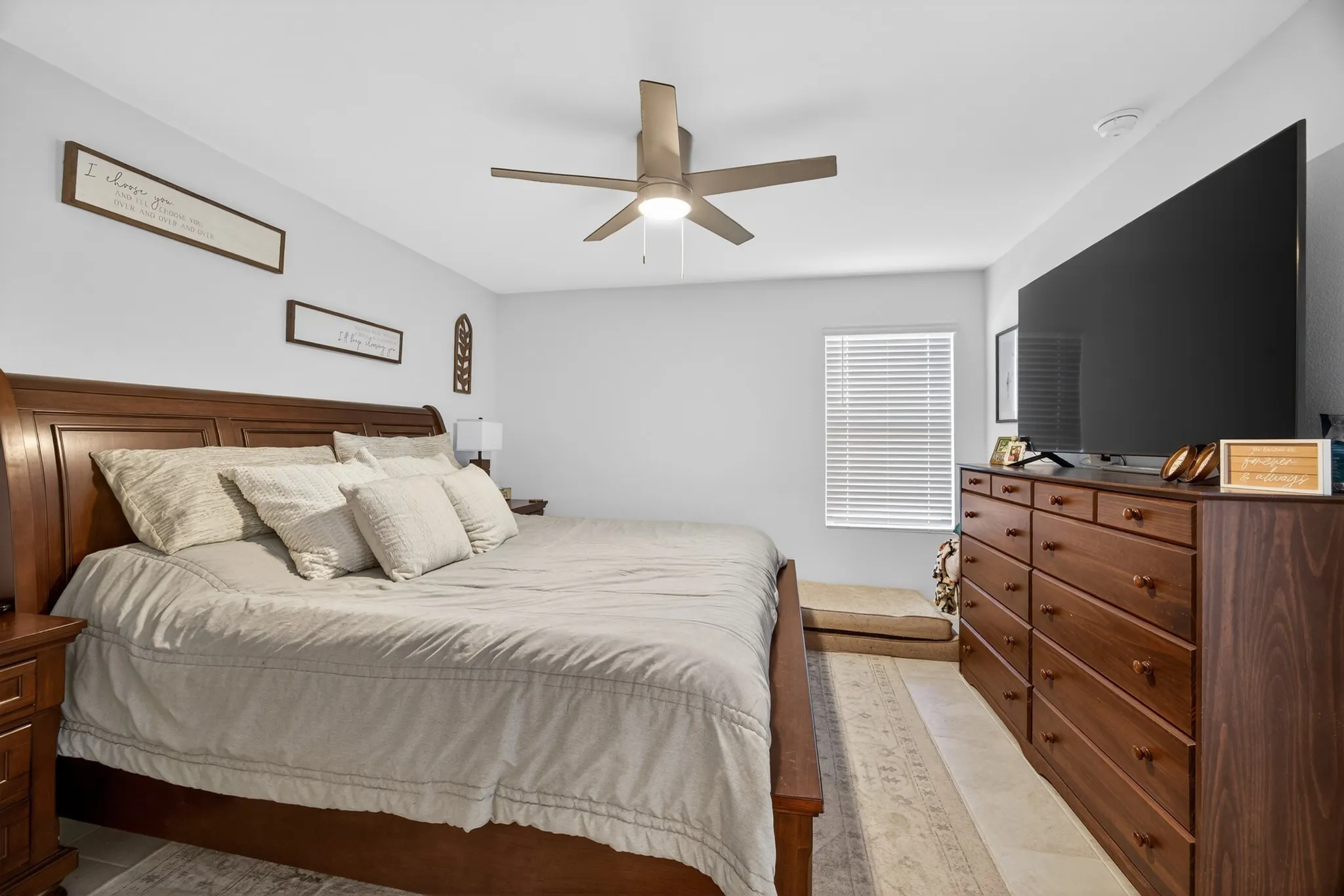 Bedroom with a ceiling fan