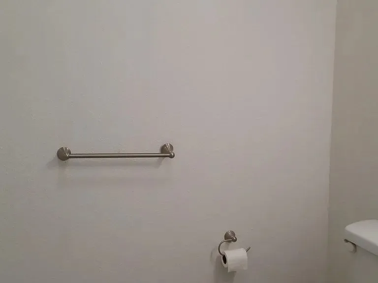 Half bathroom featuring toilet