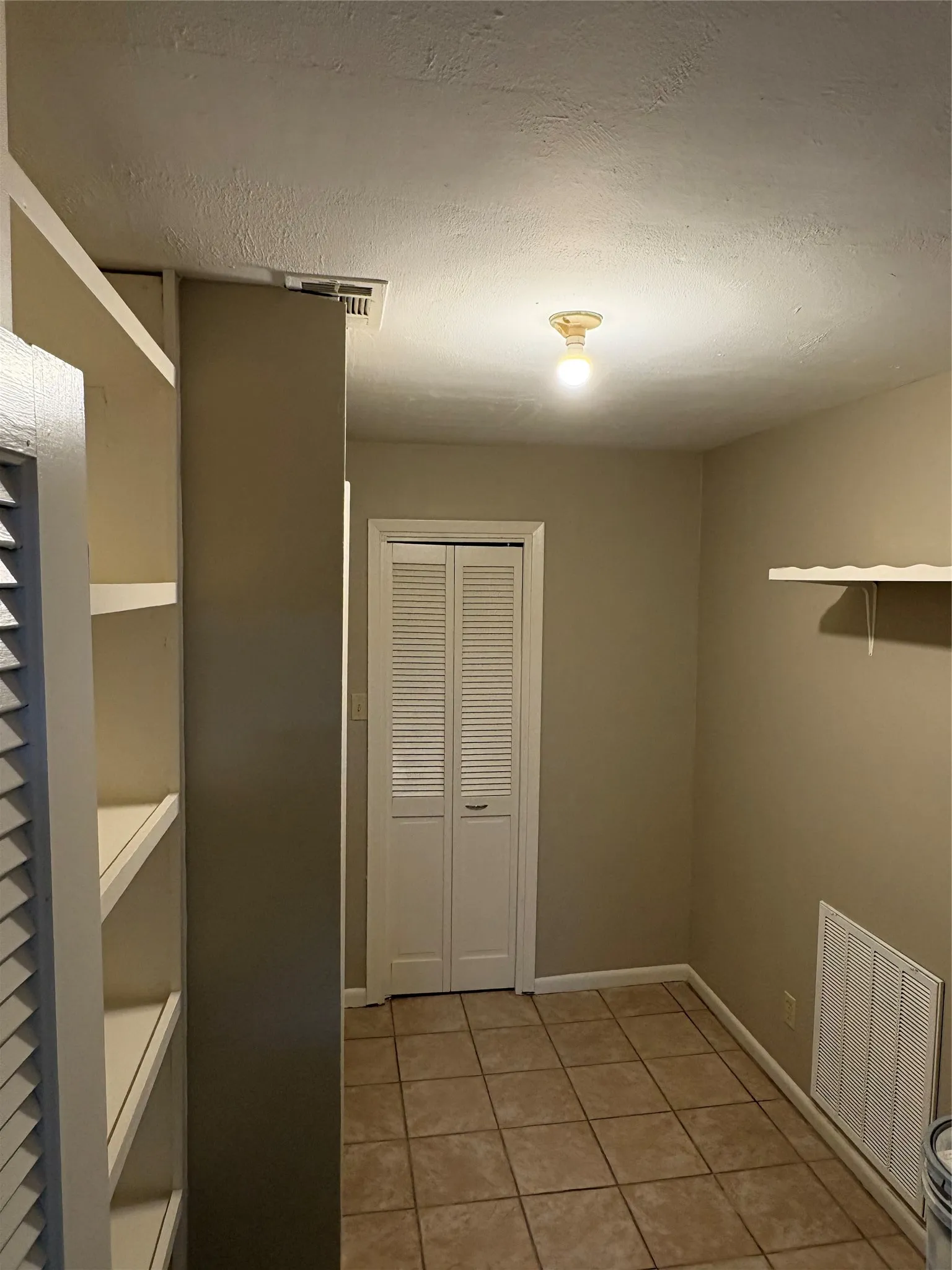 Pantry is adjacent to the kitchen.