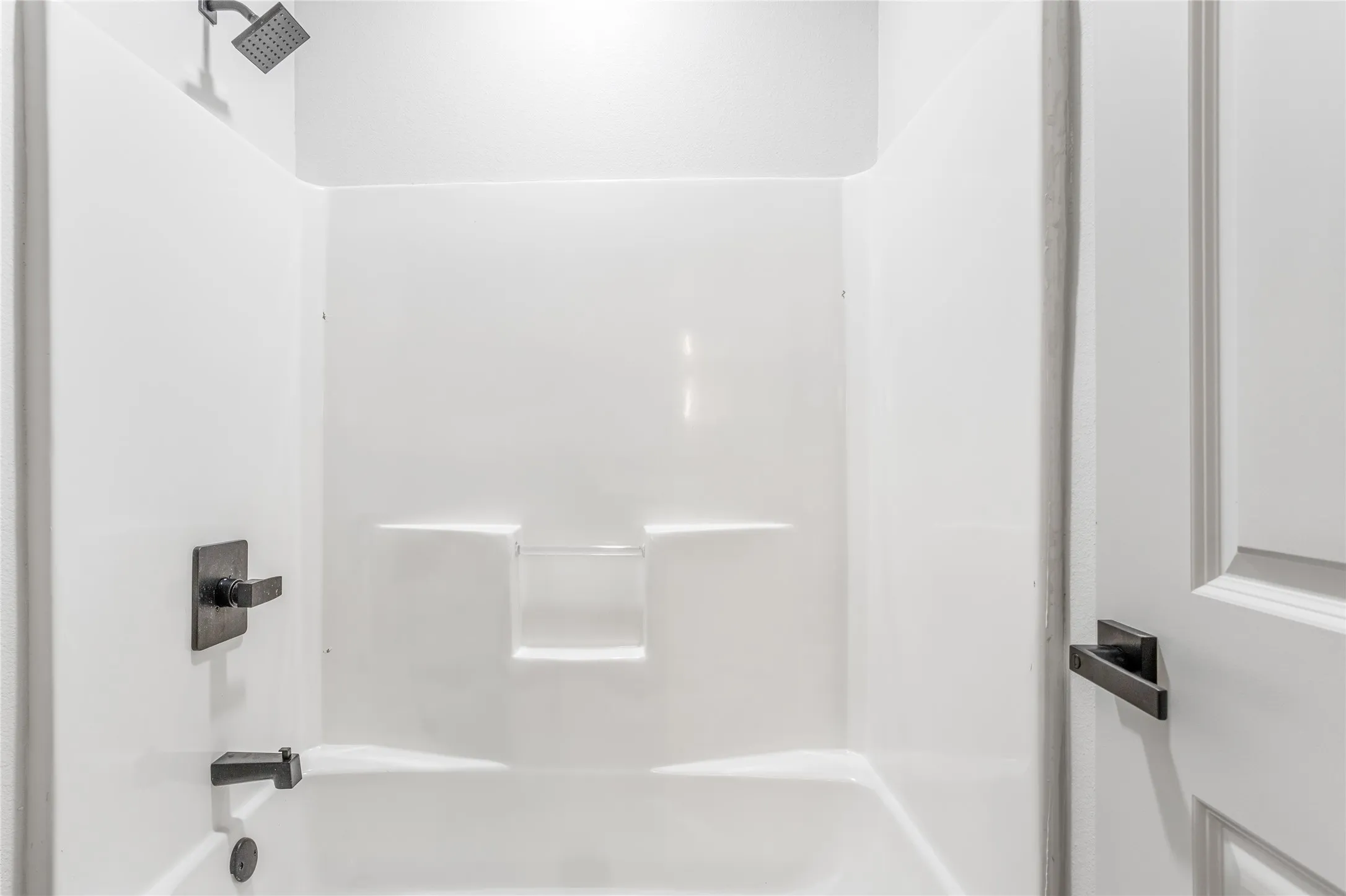 This Jack and Jill  has a shower/tub combination.