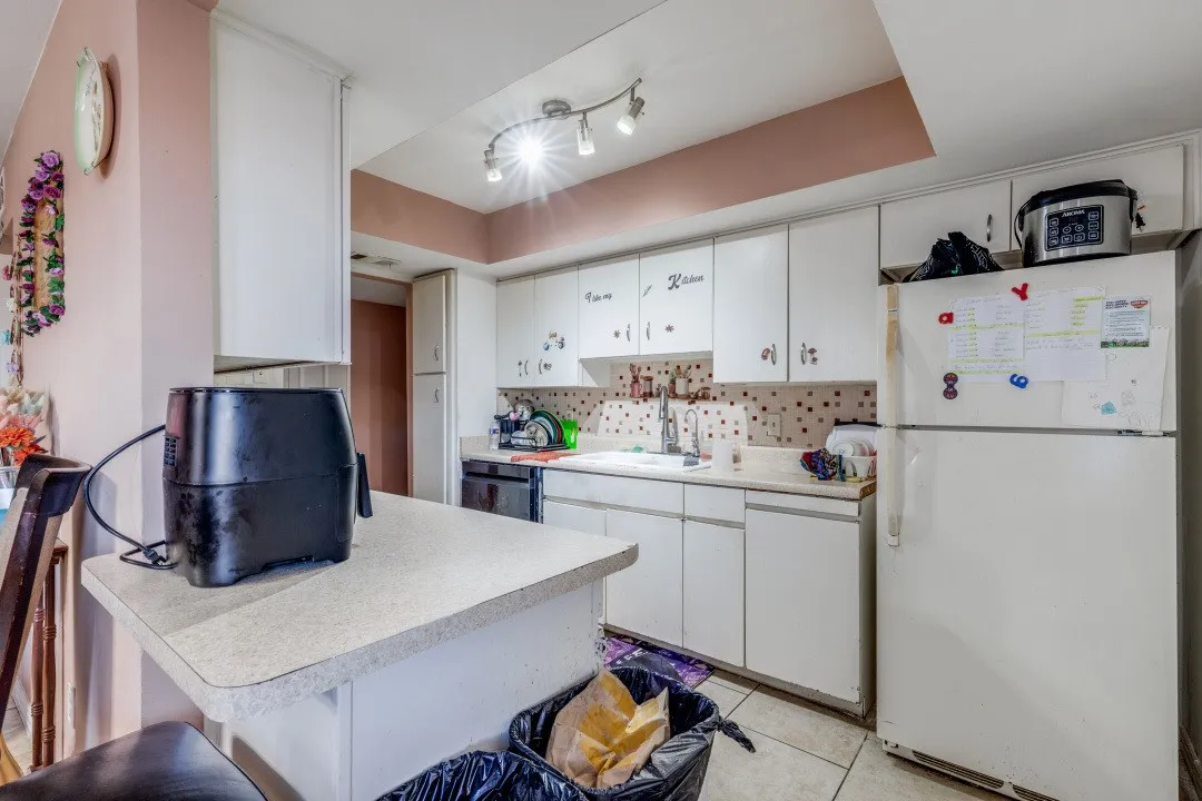 Clean white kitchen cabinetry