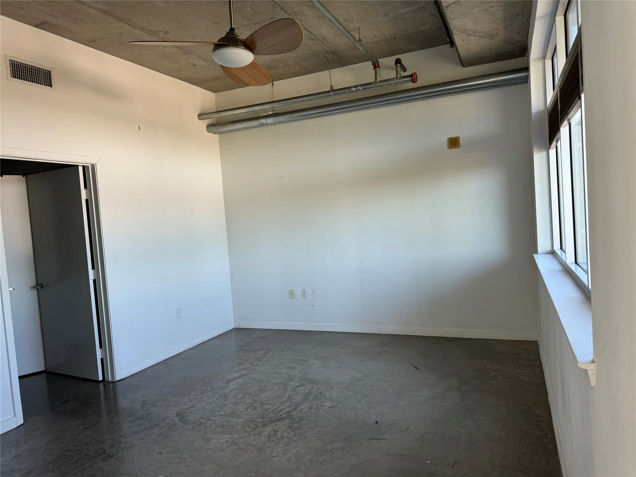 Generously Sized Bedroom with Loads of Natural Light