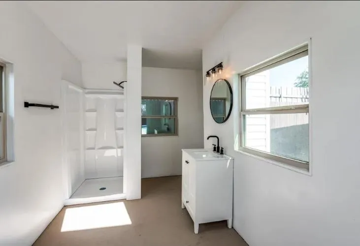 Pool house with toilet, shower, sink, and an island (not pictured but recently added)