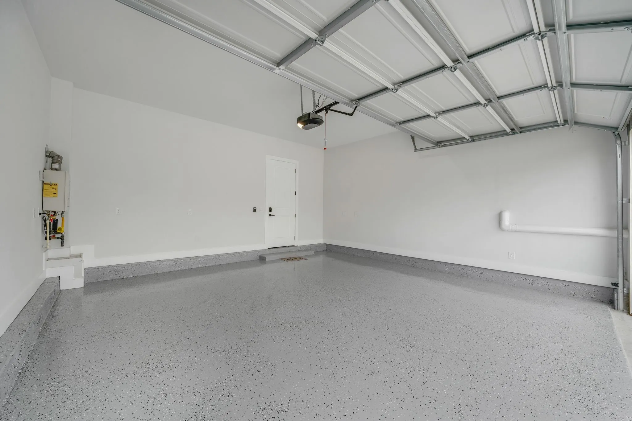 rear entry garage w epoxy floor and tankless water heater