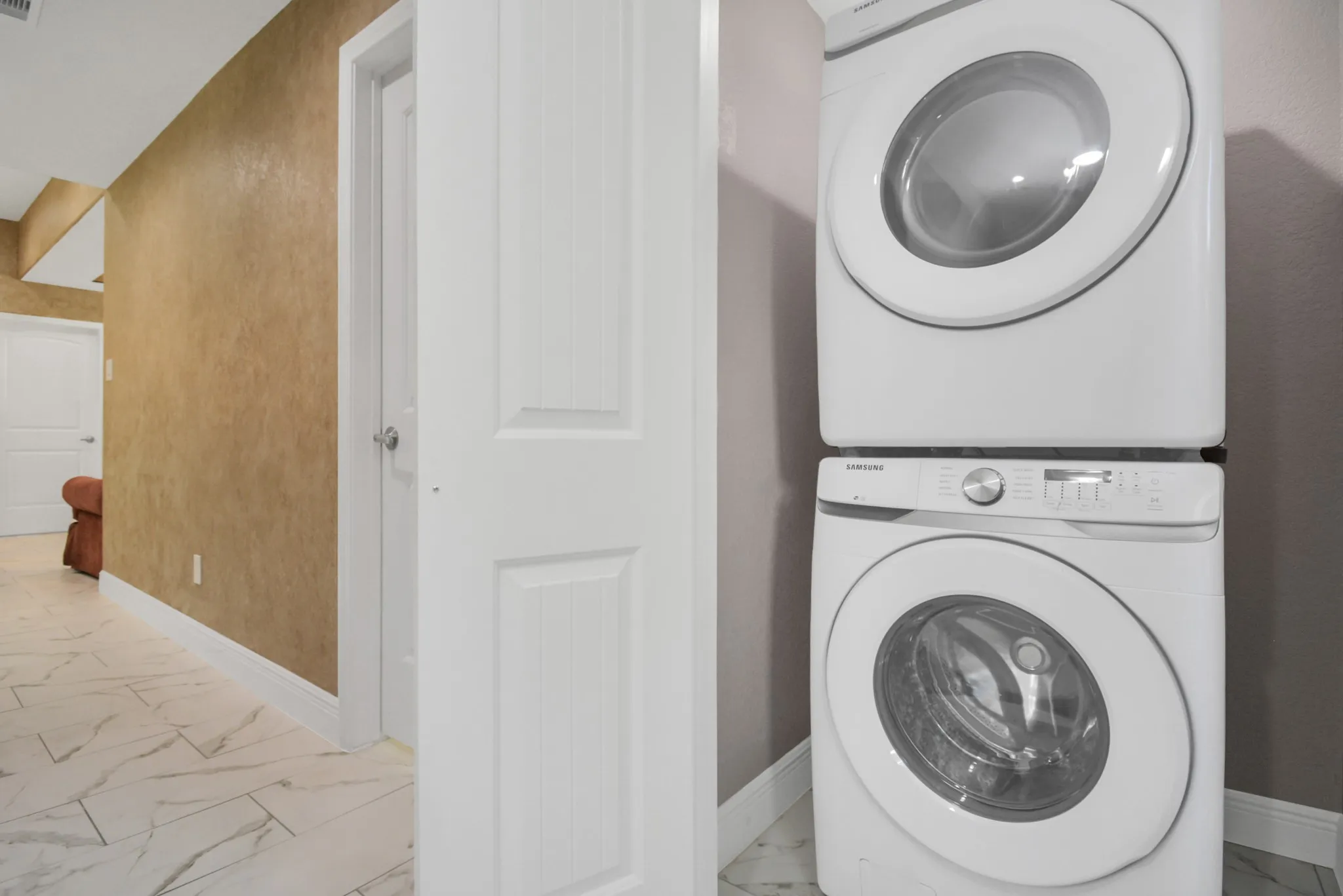 Stackable washer and dryer area