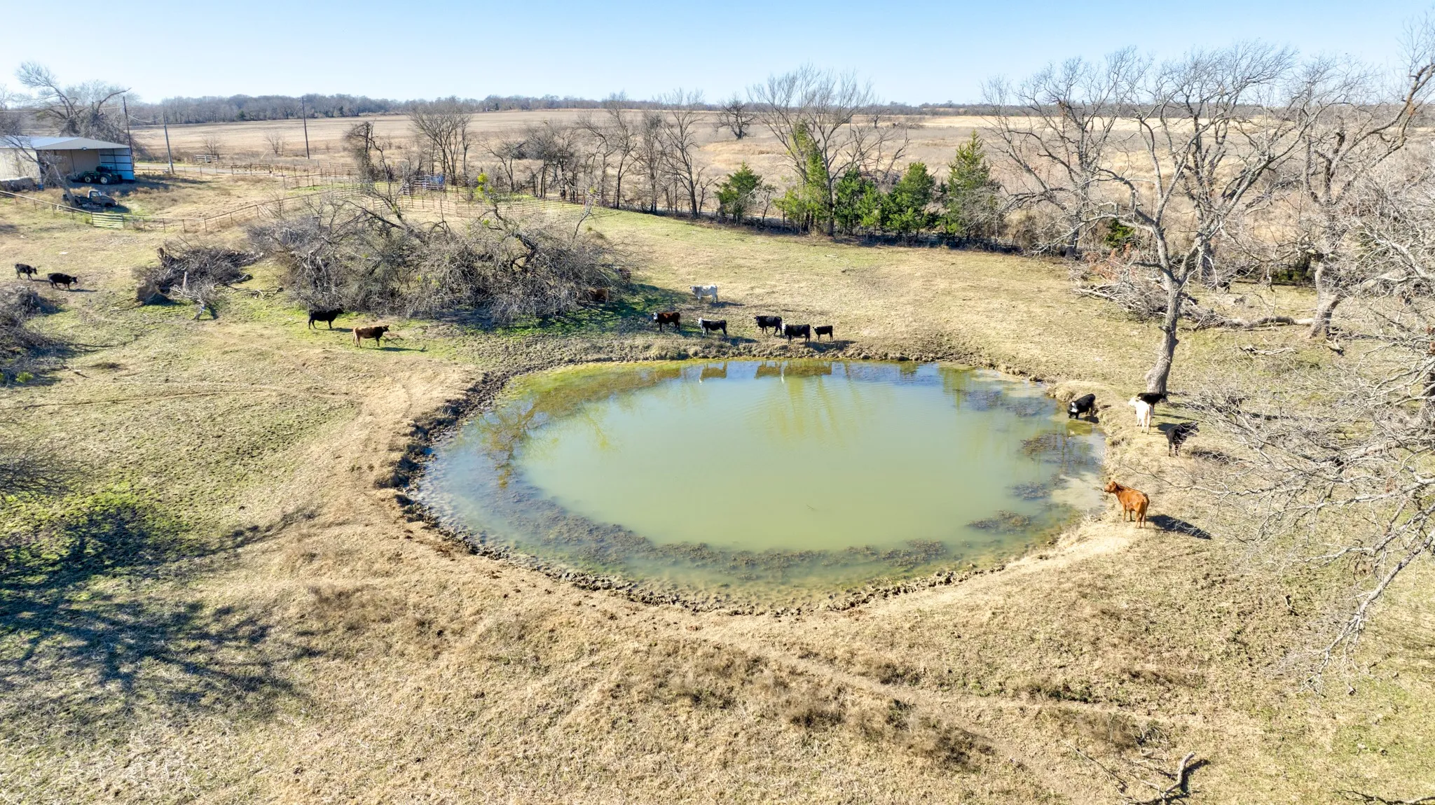Overview of rural landscape featuring a nearby body of water