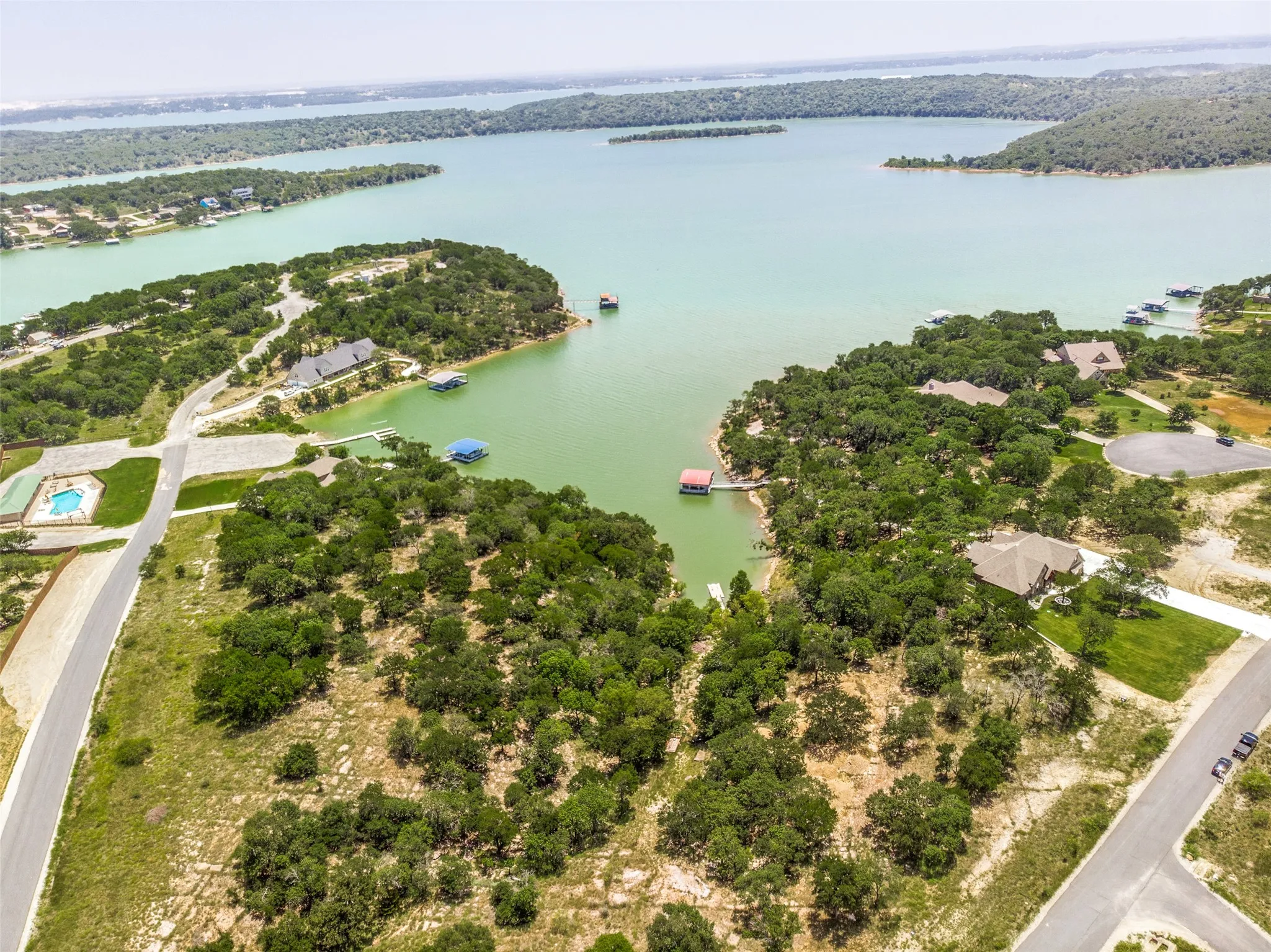 Unimproved Land For Sale in Wise County , LOT 41 Grand Harbor Boulevard, Chico, Texas 76431, 0, 0, Garage spaces, 0 Sqft, built in 2005, mls#21149840, Real Estate Agent in Chico, Homes For Sale in Wise county, Homes For Sale in Chico, Realtor in Chico Texas, Real Estate Brokerage Independent Realty Texas, Luminita Cordes Realtor