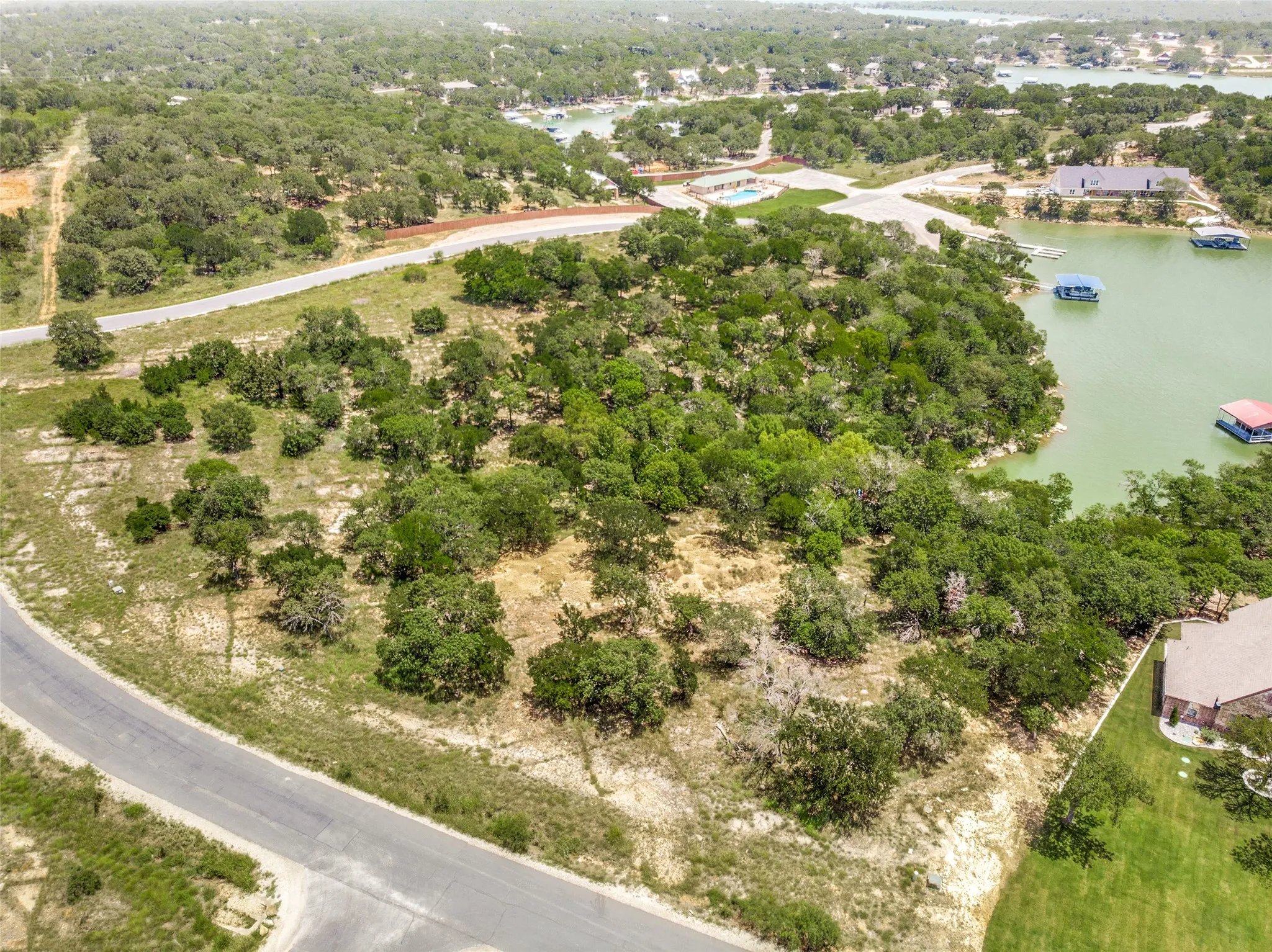 Unimproved Land For Sale in Wise County , LOT 41 Grand Harbor Boulevard, Chico, Texas 76431, 0, 0, Garage spaces, 0 Sqft, built in 2005, mls#21149840, Real Estate Agent in Chico, Homes For Sale in Wise county, Homes For Sale in Chico, Realtor in Chico Texas, Real Estate Brokerage Independent Realty Texas, Luminita Cordes Realtor