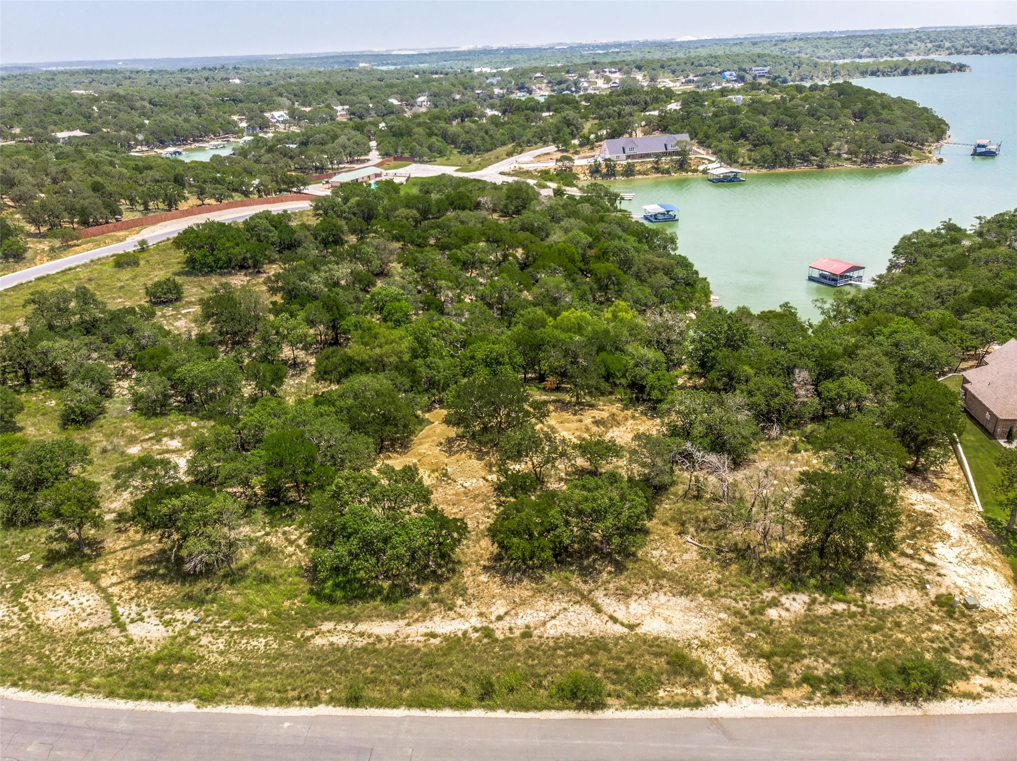 Unimproved Land For Sale in Wise County , LOT 41 Grand Harbor Boulevard, Chico, Texas 76431, 0, 0, Garage spaces, 0 Sqft, built in 2005, mls#21149840, Real Estate Agent in Chico, Homes For Sale in Wise county, Homes For Sale in Chico, Realtor in Chico Texas, Real Estate Brokerage Independent Realty Texas, Luminita Cordes Realtor