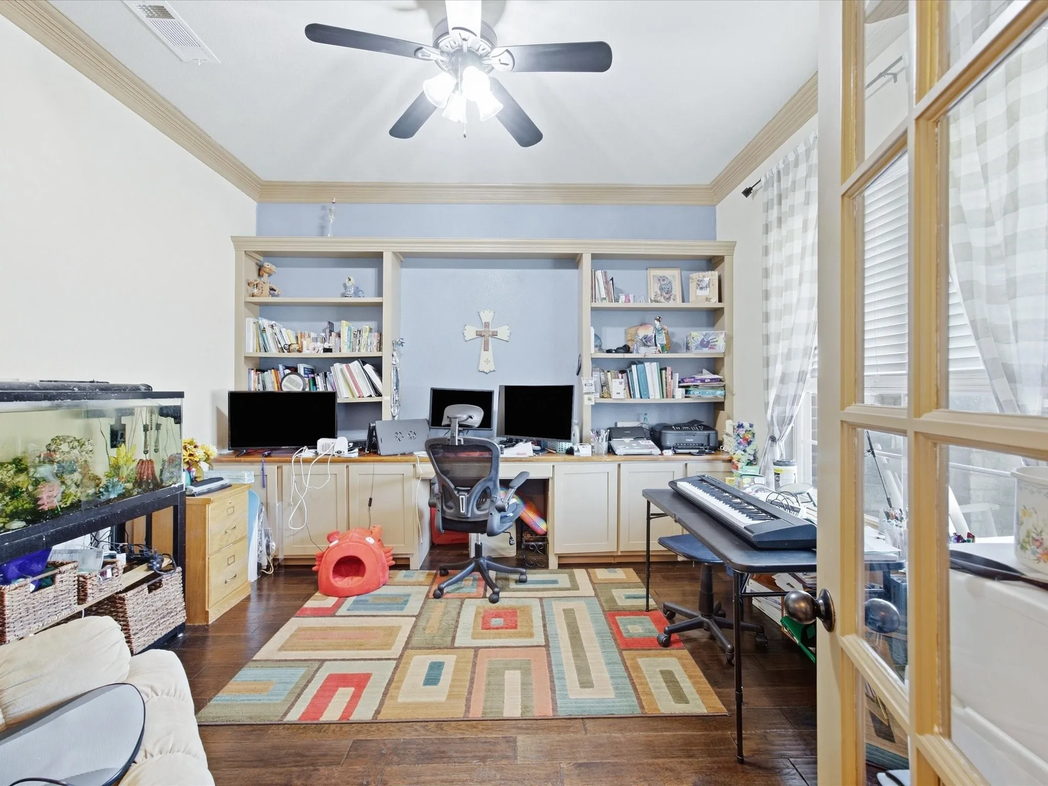 Built-in shelving and cabinetry with a recessed central area