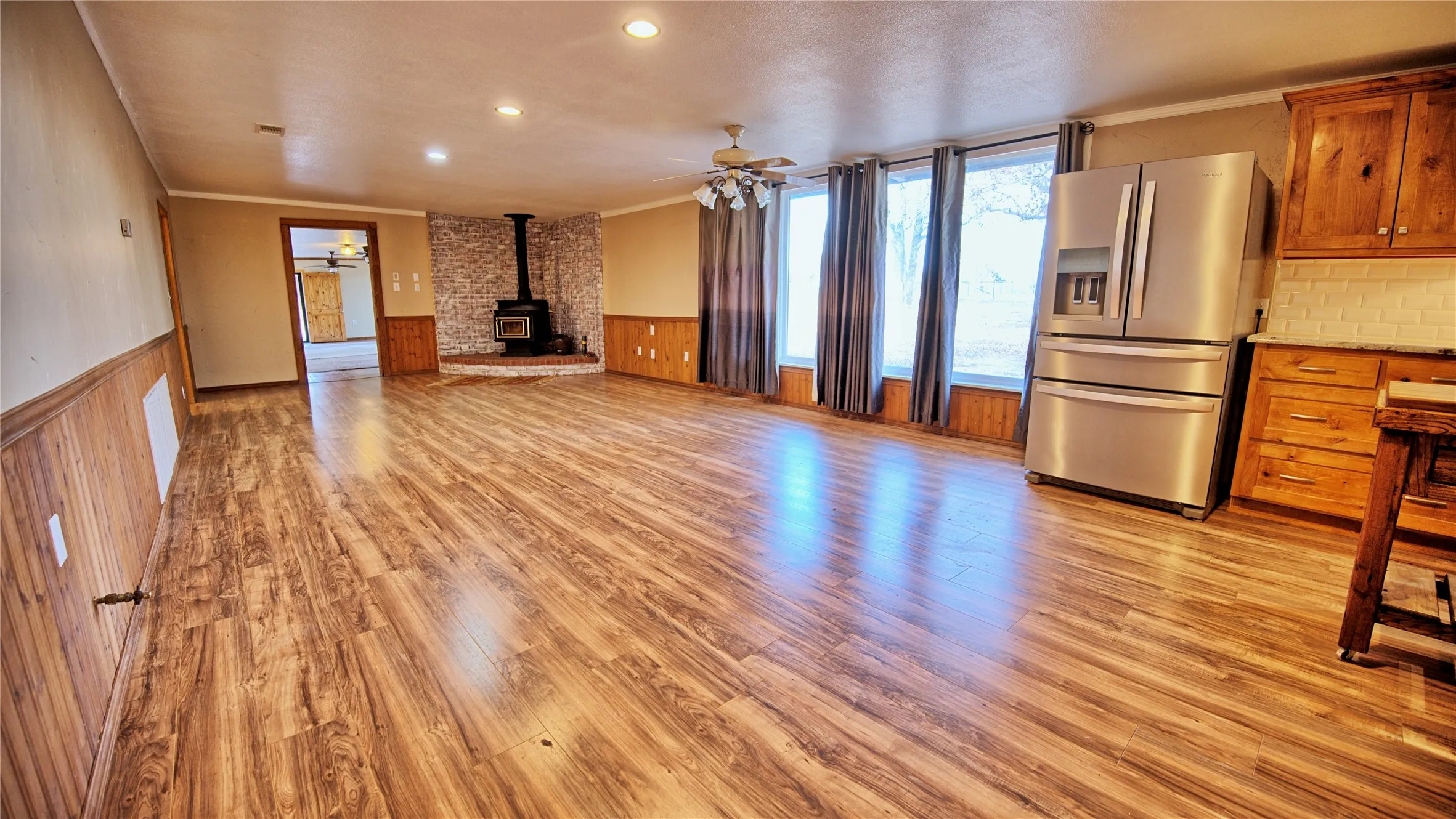 family room or den and dining room and kitchen