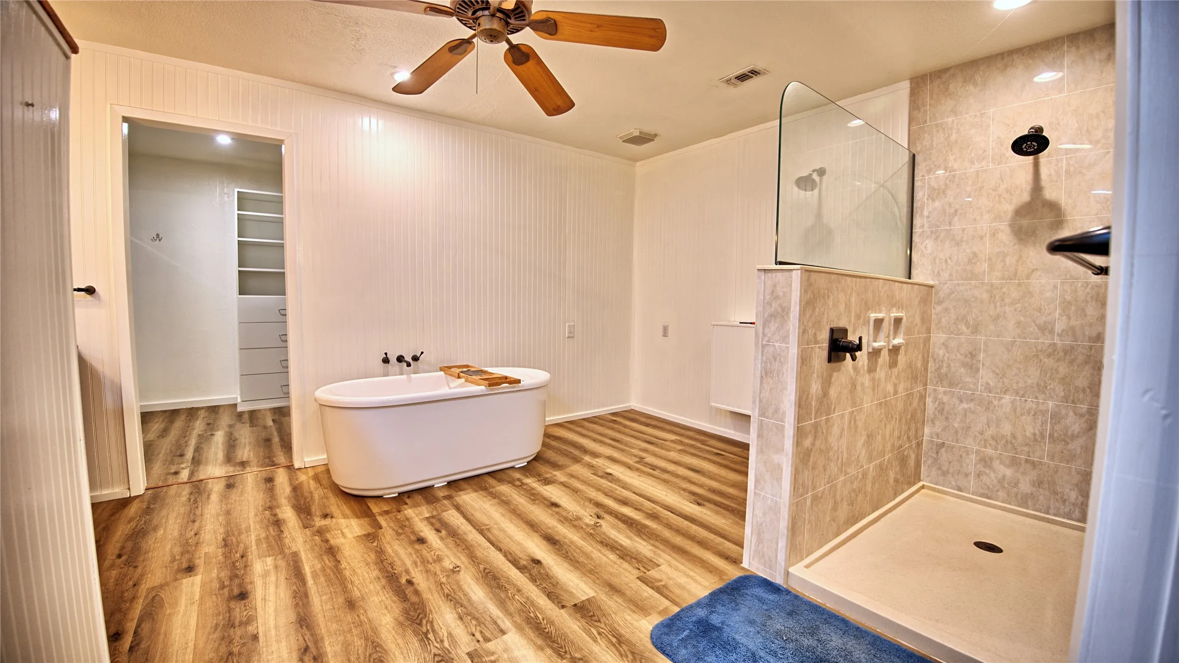 Primary bathroom with soaking tub and walk in shower