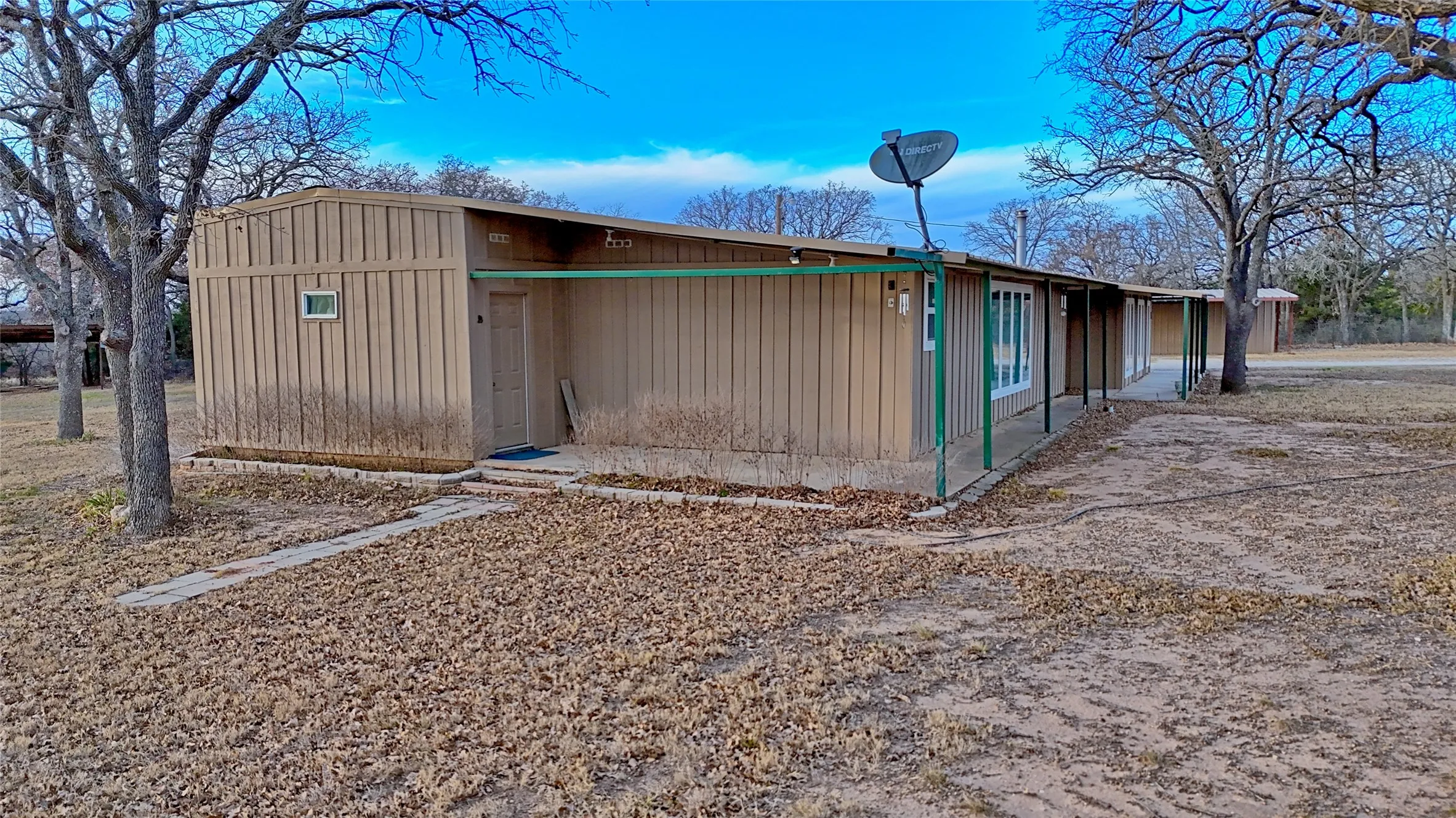 Primary bedroom has it's own covered porch