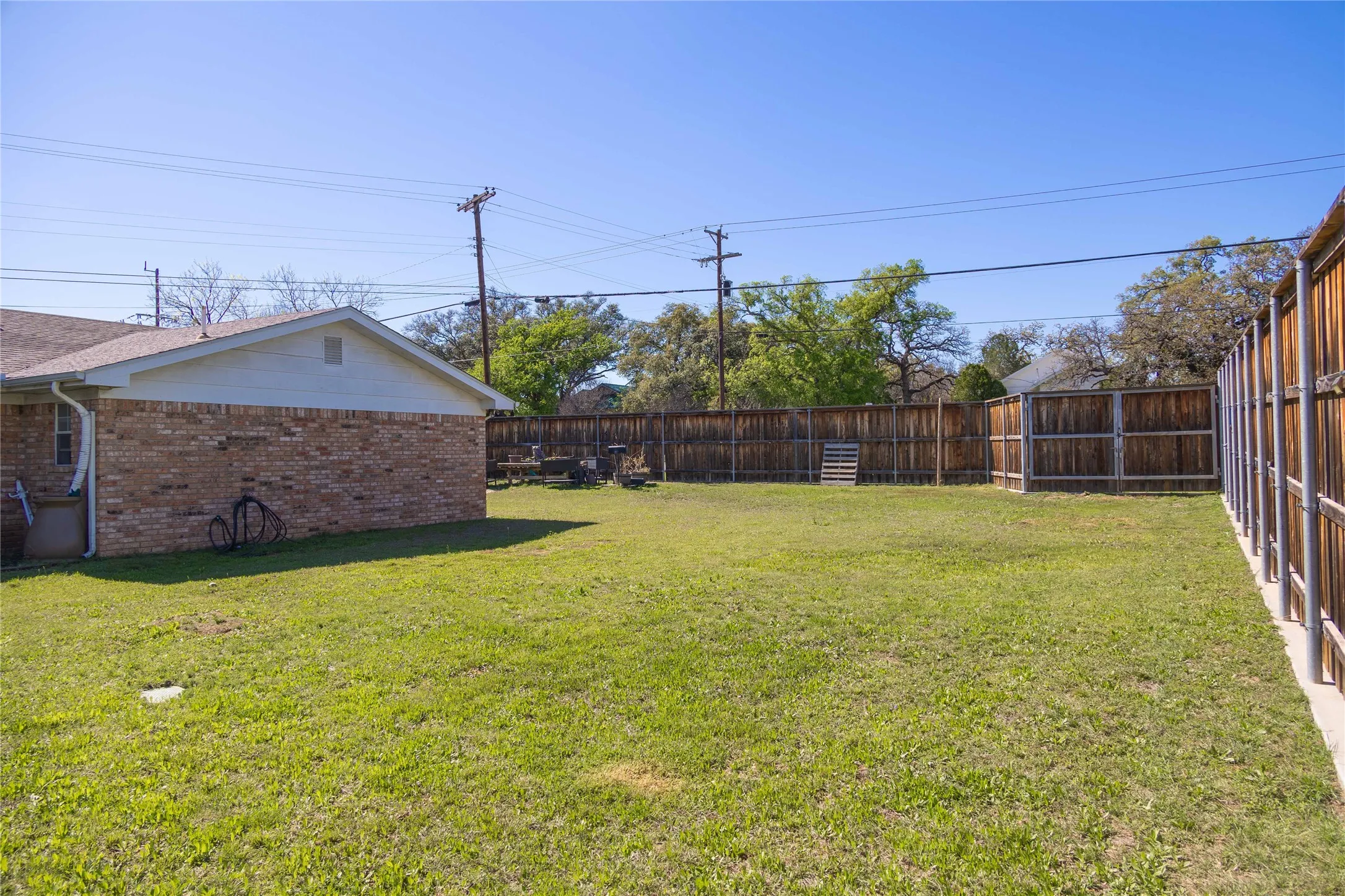 View of yard featuring a fenced backyard