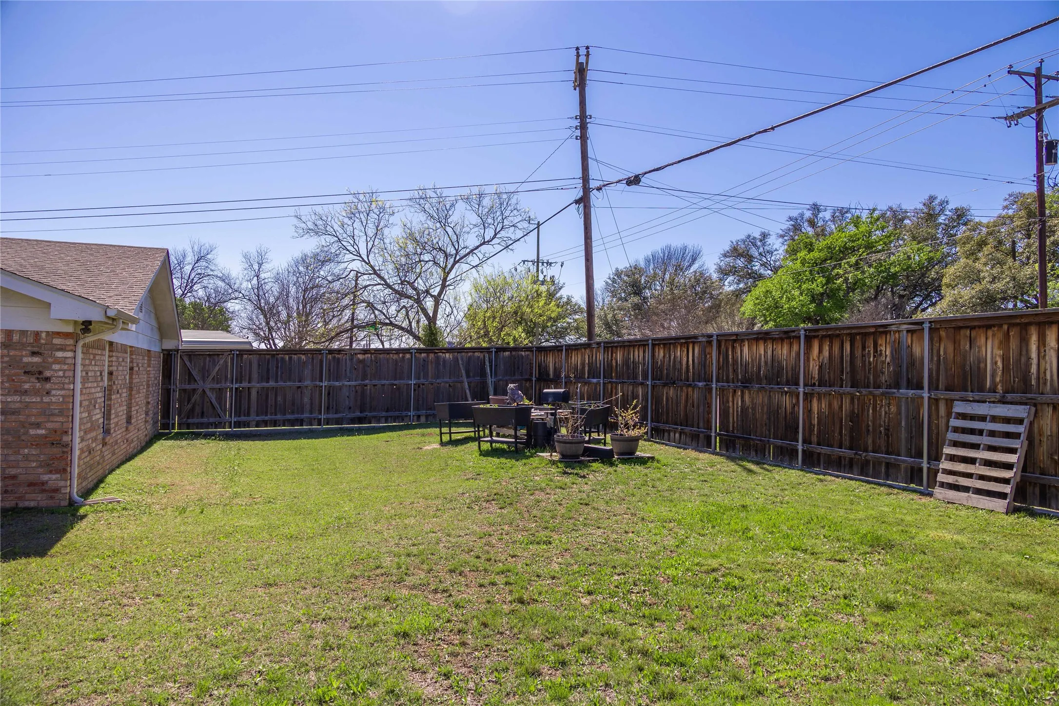 View of yard featuring a fenced backyard