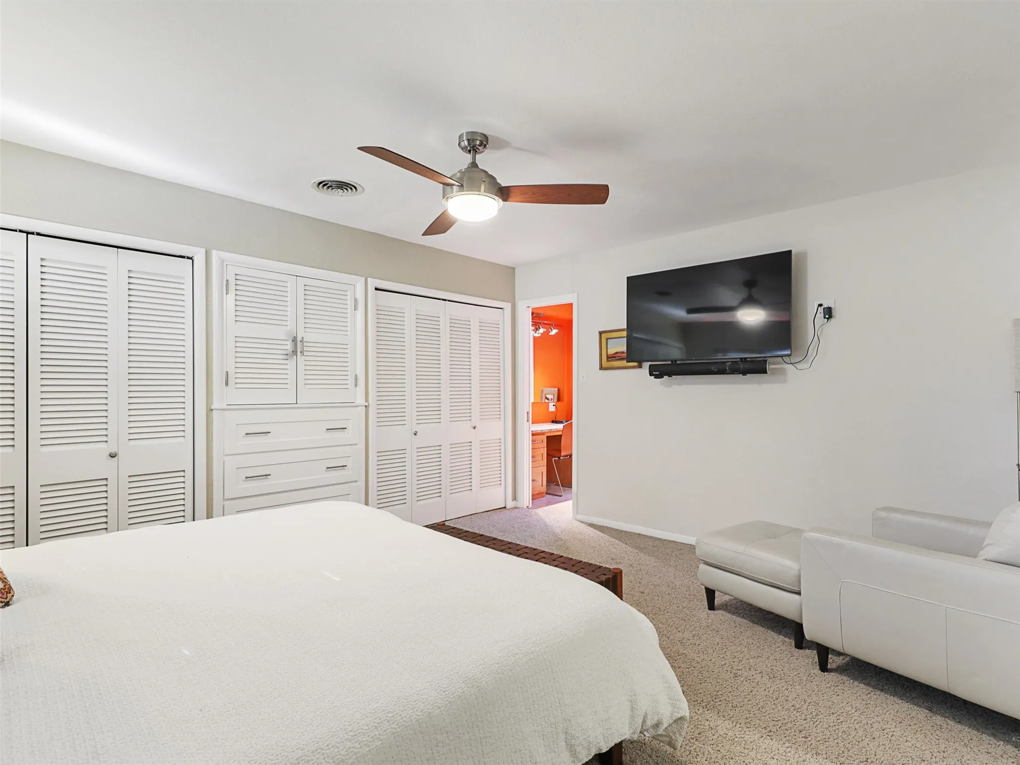 Bright guest bedroom with clean lines and natural light