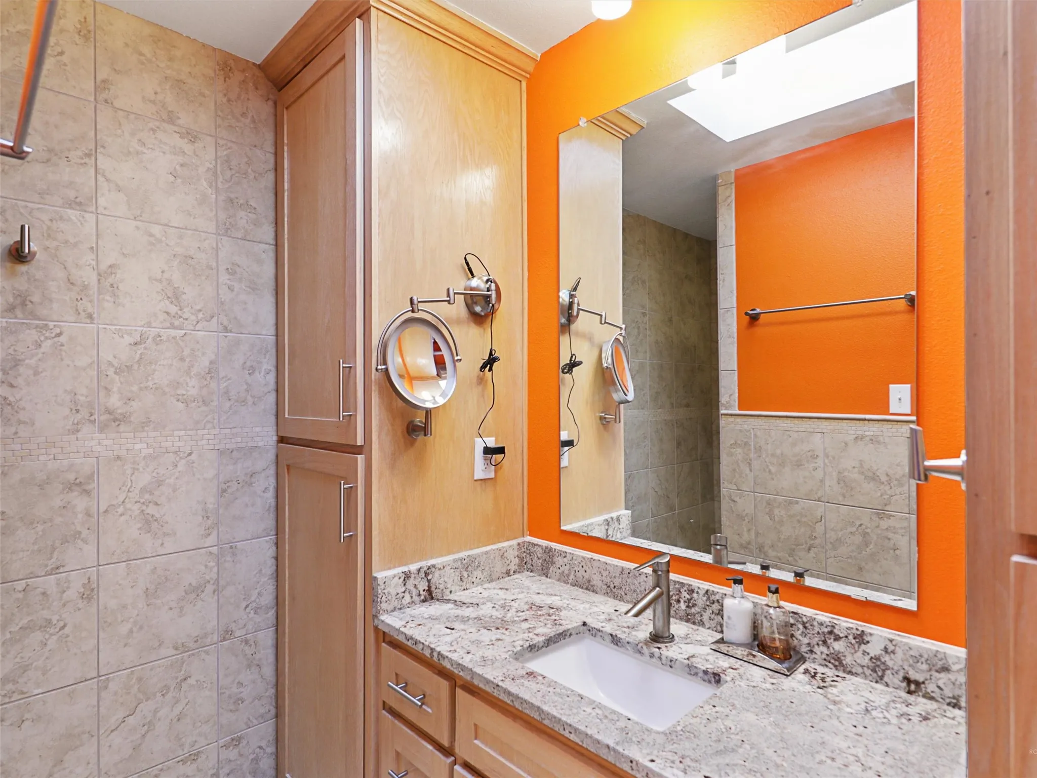 Freshly painted primary bathroom with updated finishes