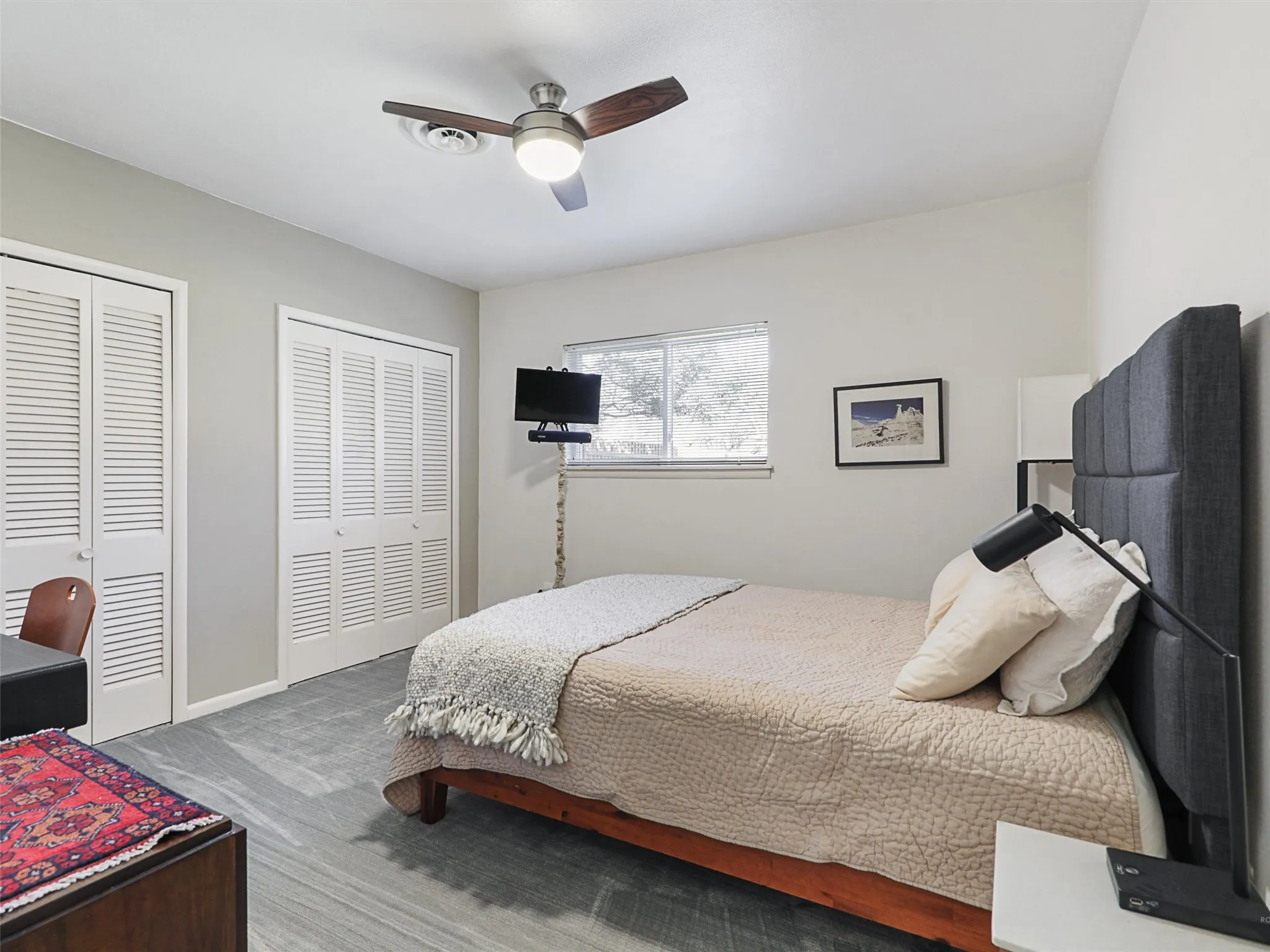 Additional bedroom featuring functional layout and closet storage