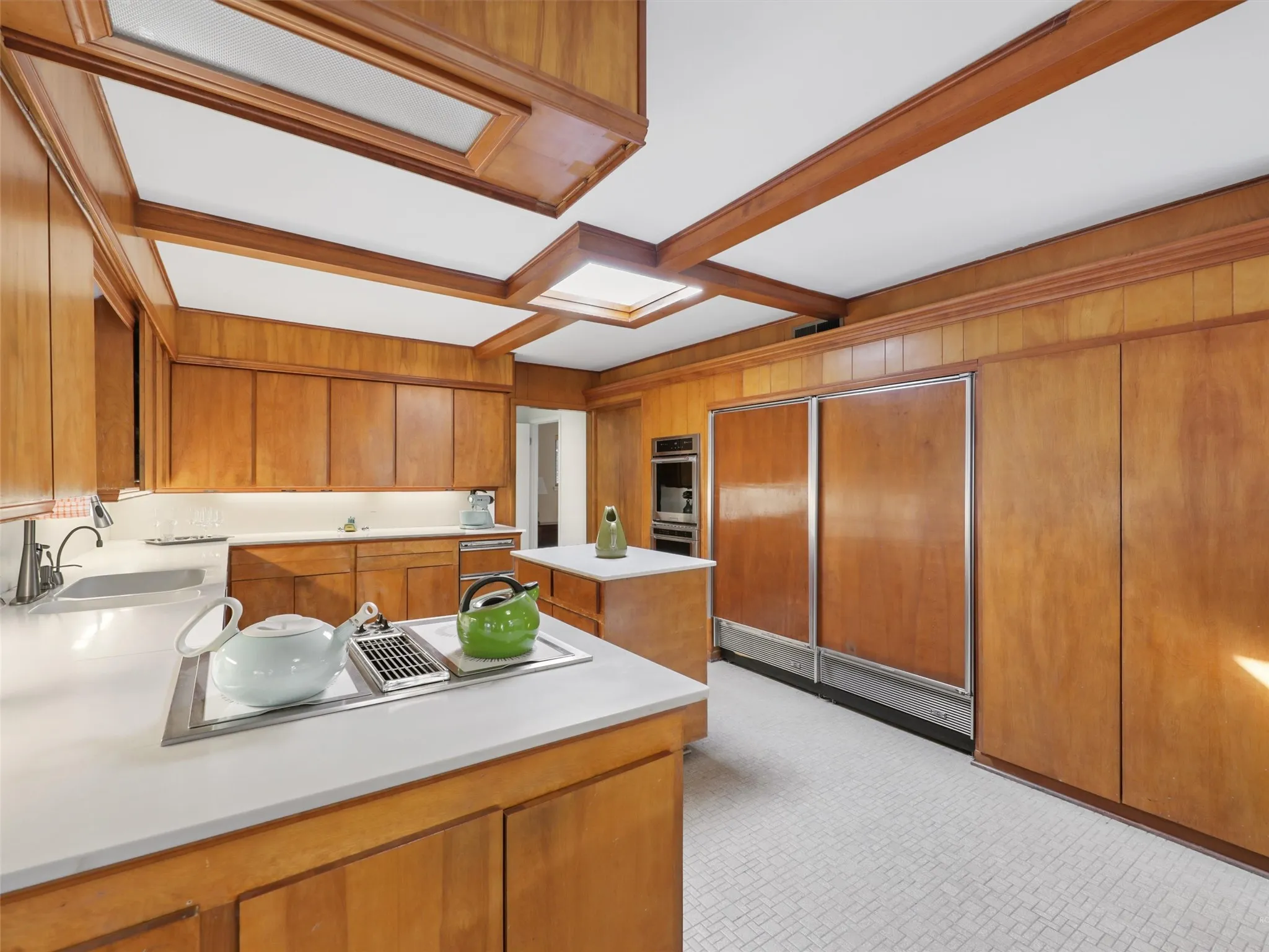 Kitchen with abundant prep space and mid-century design elements