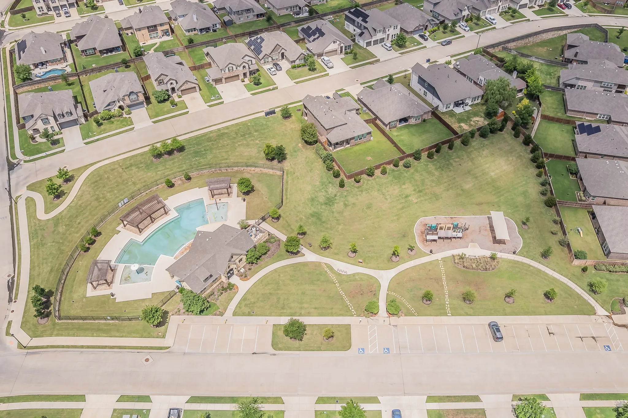 Another view of the community pool and amenity center