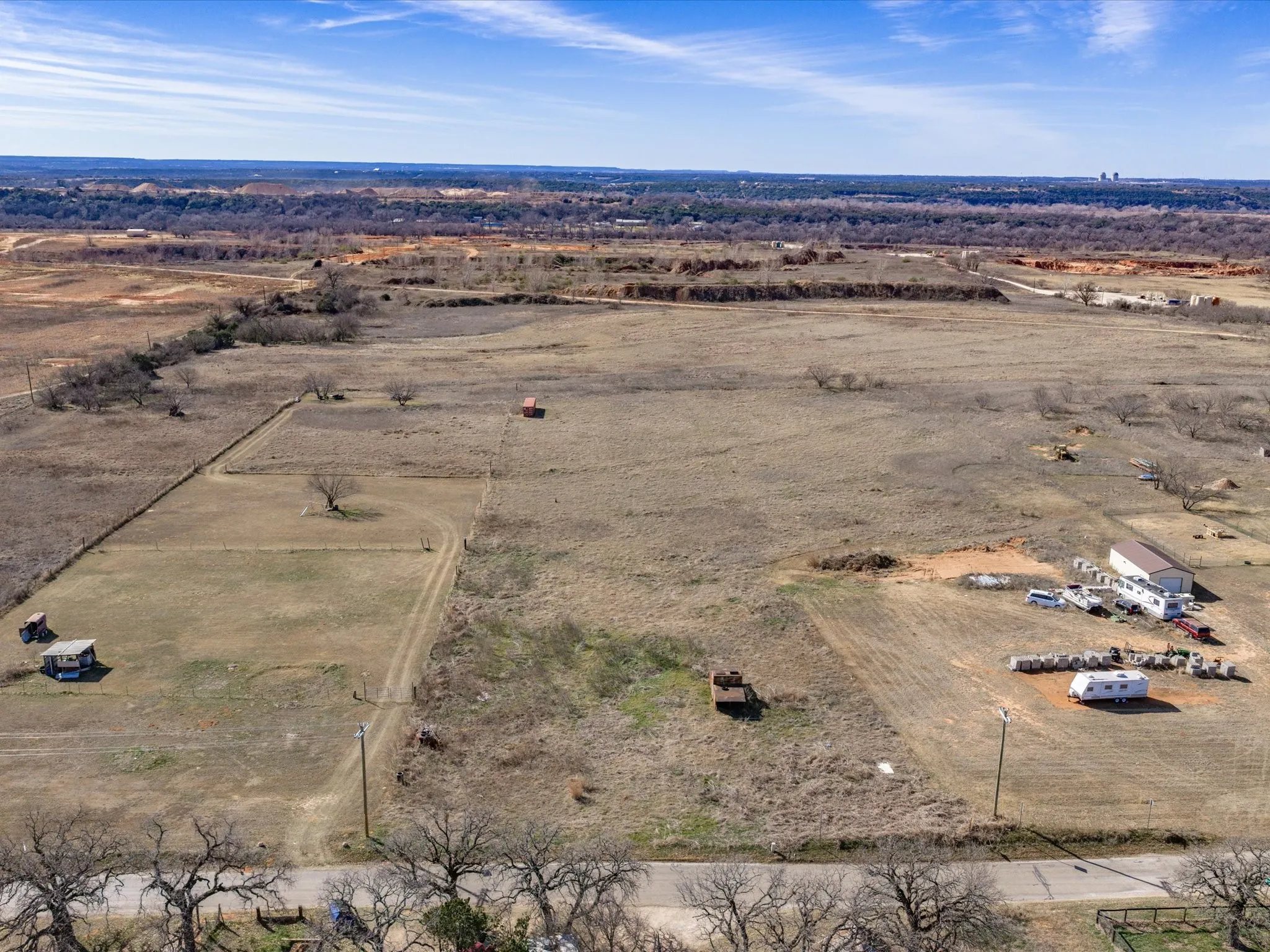 Aerial view of property and surrounding area with rural landscape
