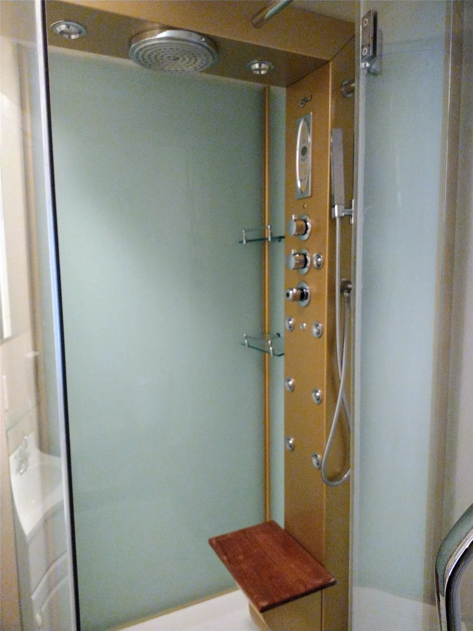 Full bathroom with a stall shower