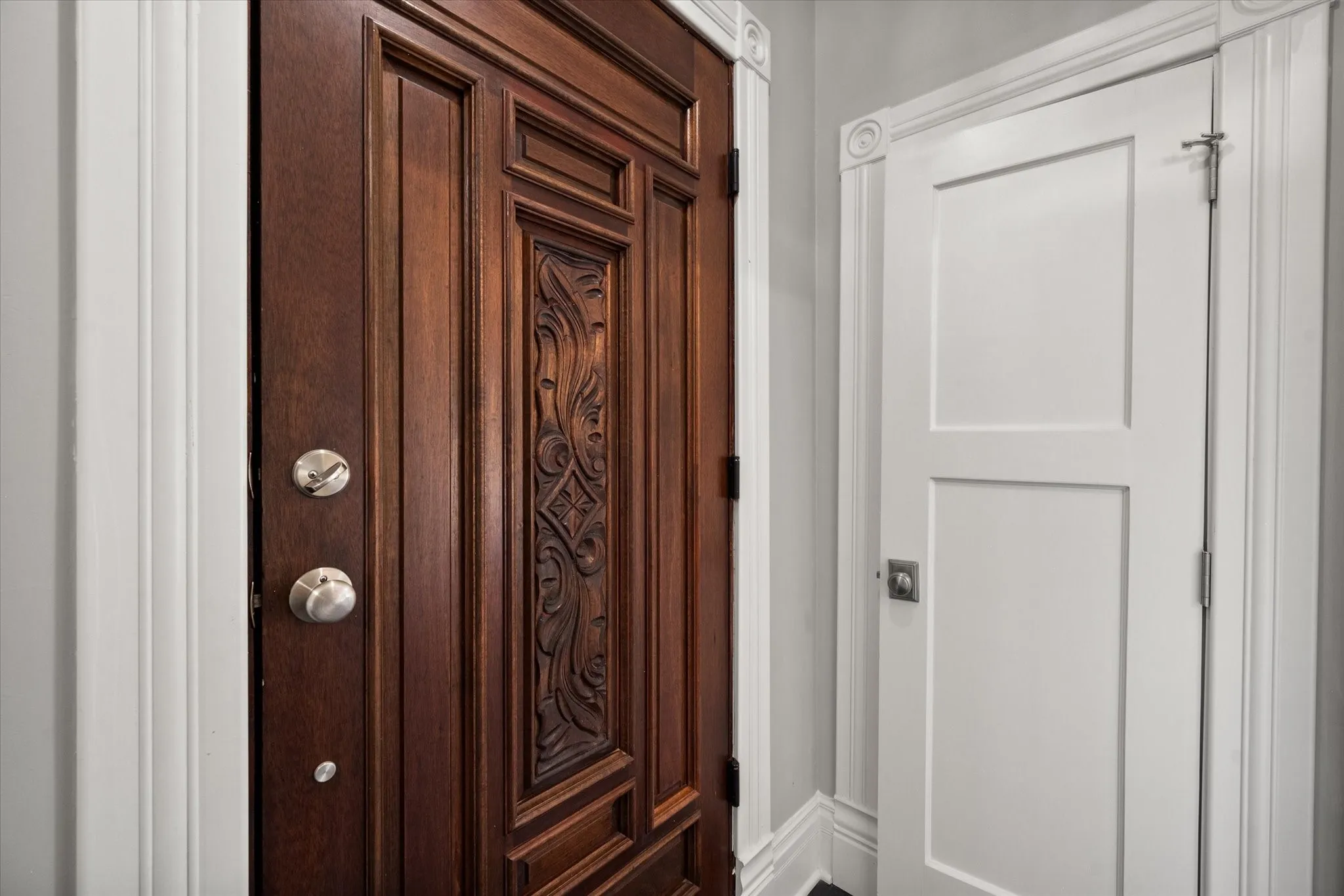 Door off upstairs primary bedroom to covered patio