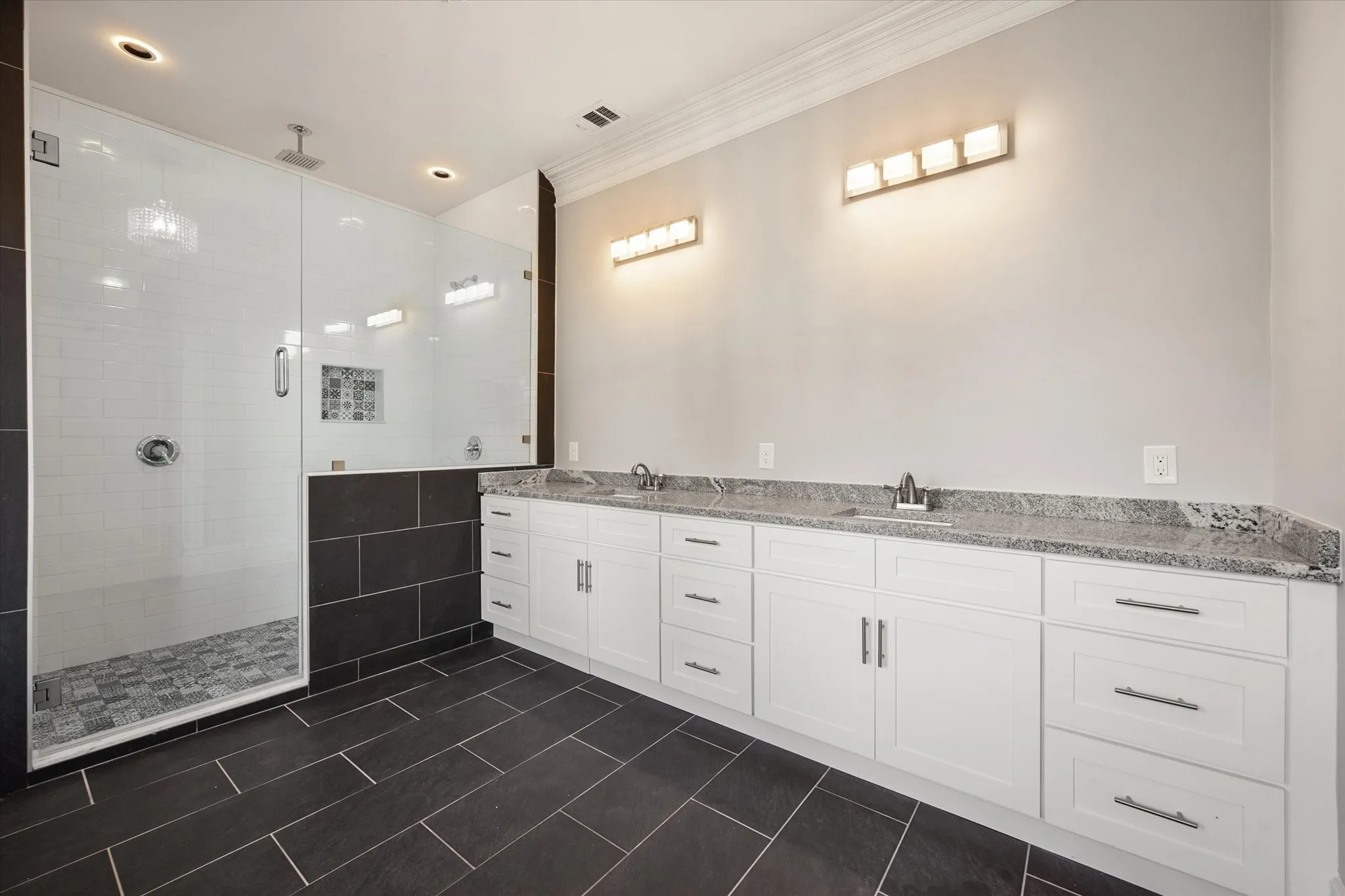 upstairs primary bedroom bath with double sinks