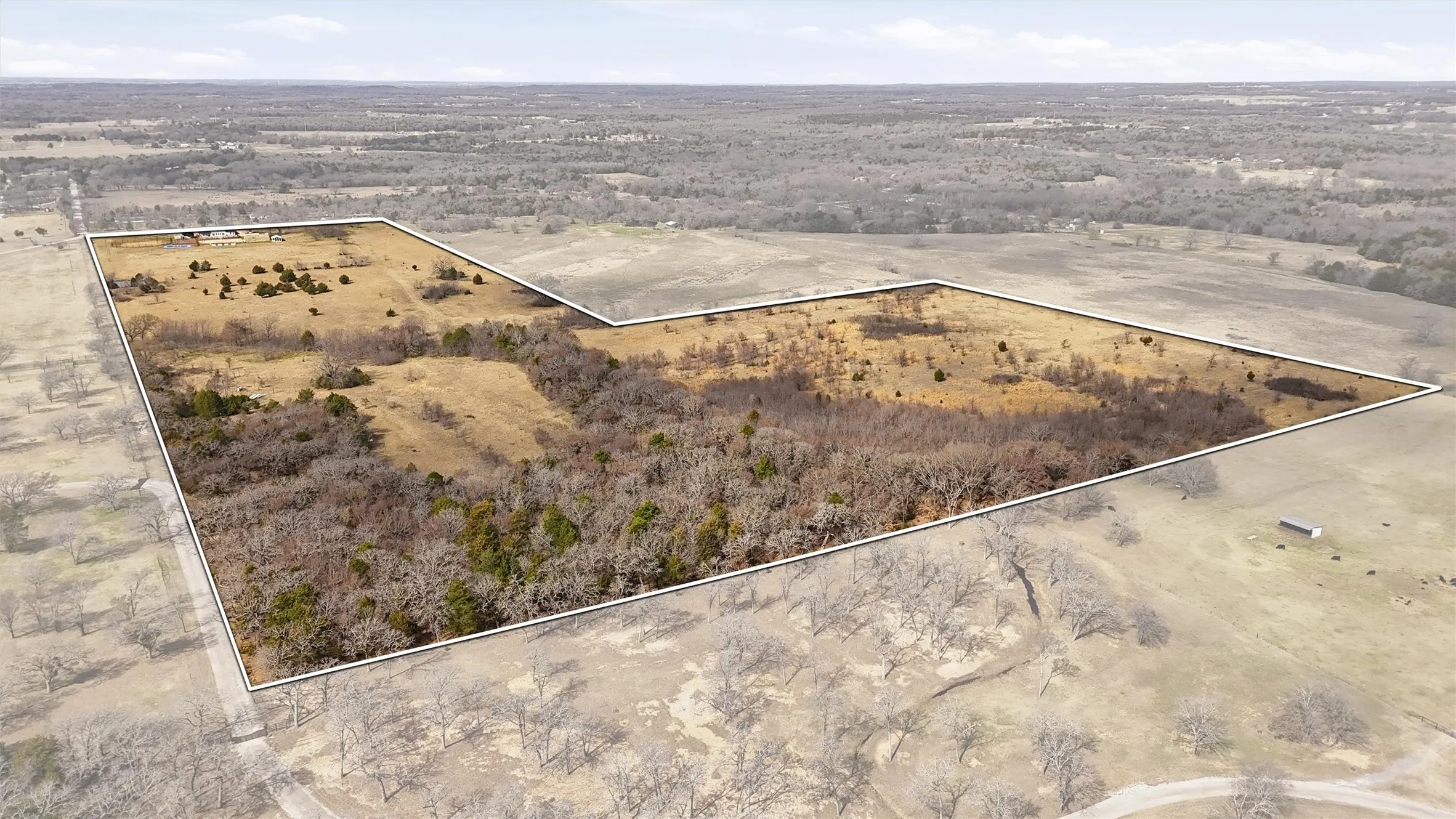 Aerial view from the back of the property looking towards County Road 297.