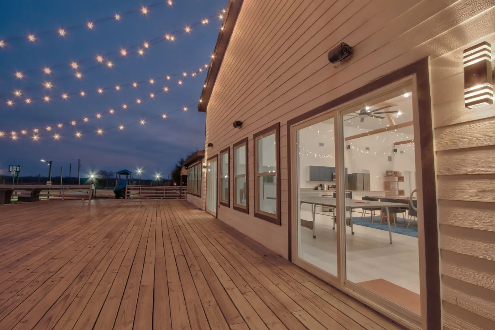 Large back deck accessible through sliding doors.