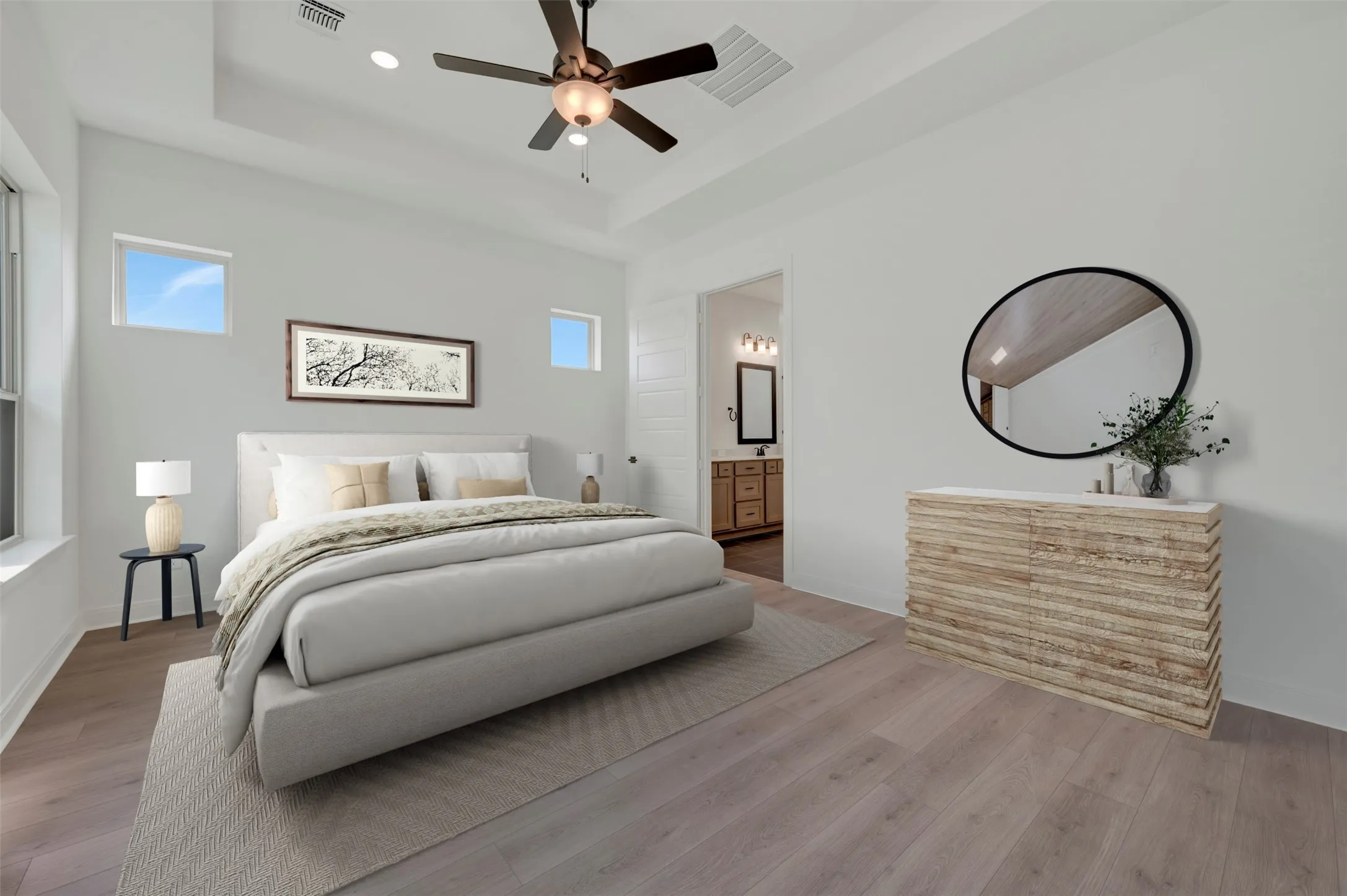 Recessed lighting, ceiling fan, tray ceiling, and wood-finish flooring