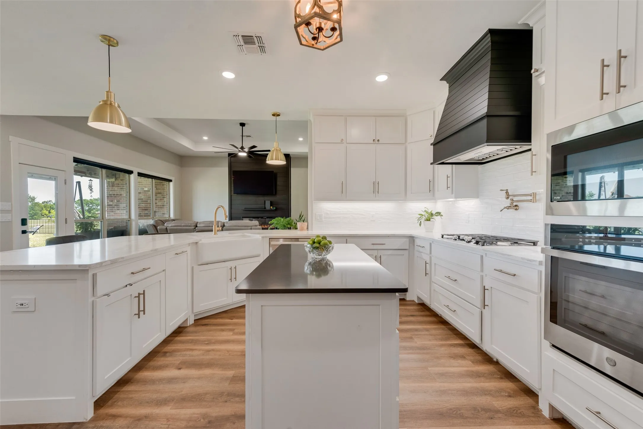 Well layed out kitchen with gas range and pot filler for convenience