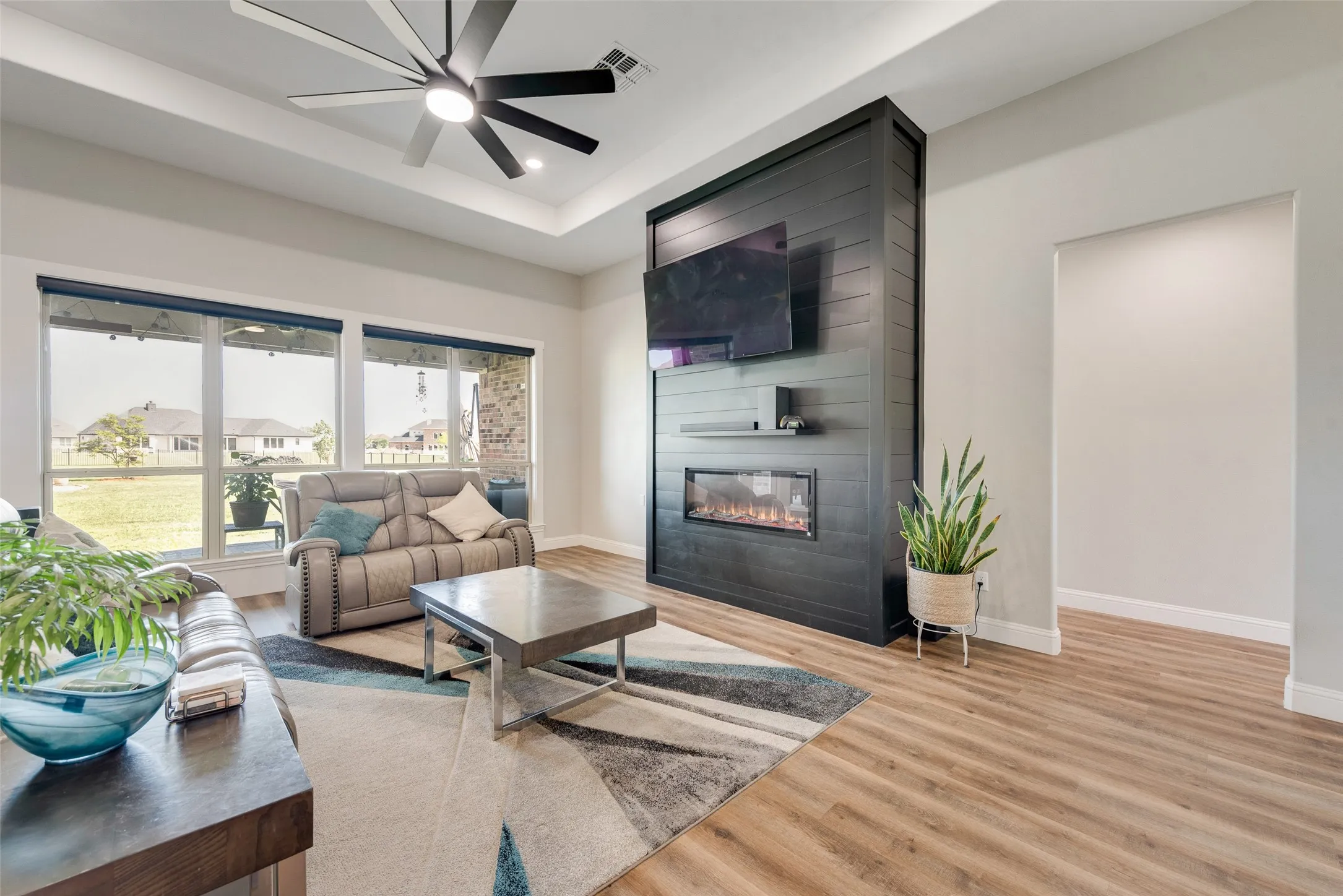 Ceiling fan and electric fireplace.