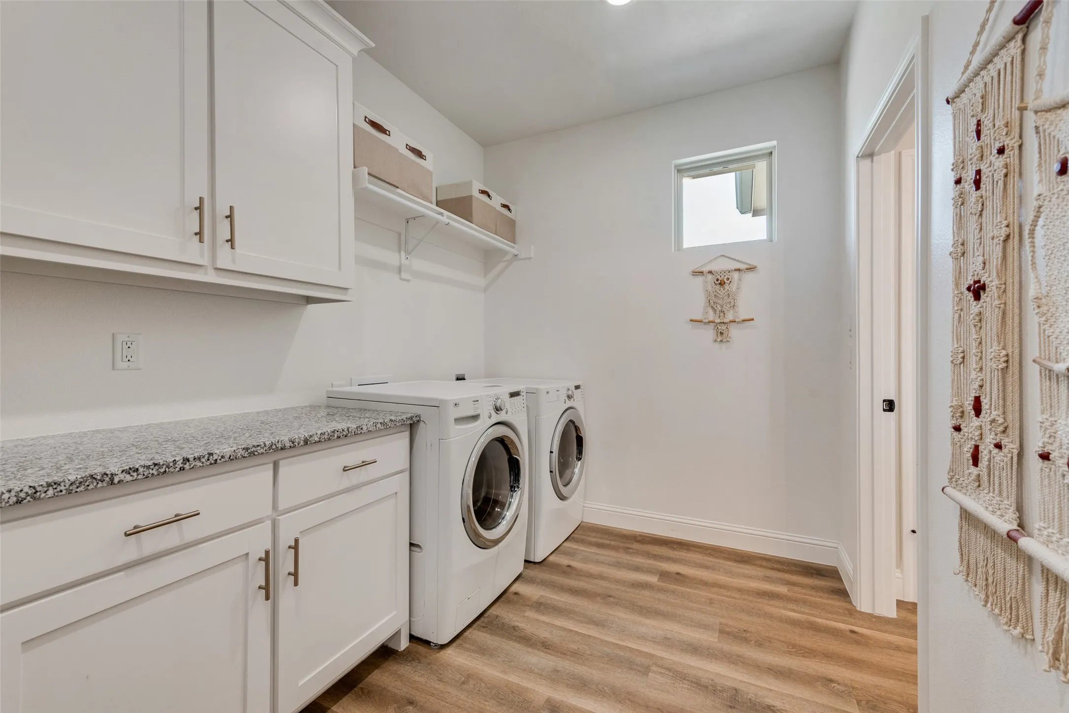 Laundry is located off of the primary ensuite.  Also features plenty of storage.