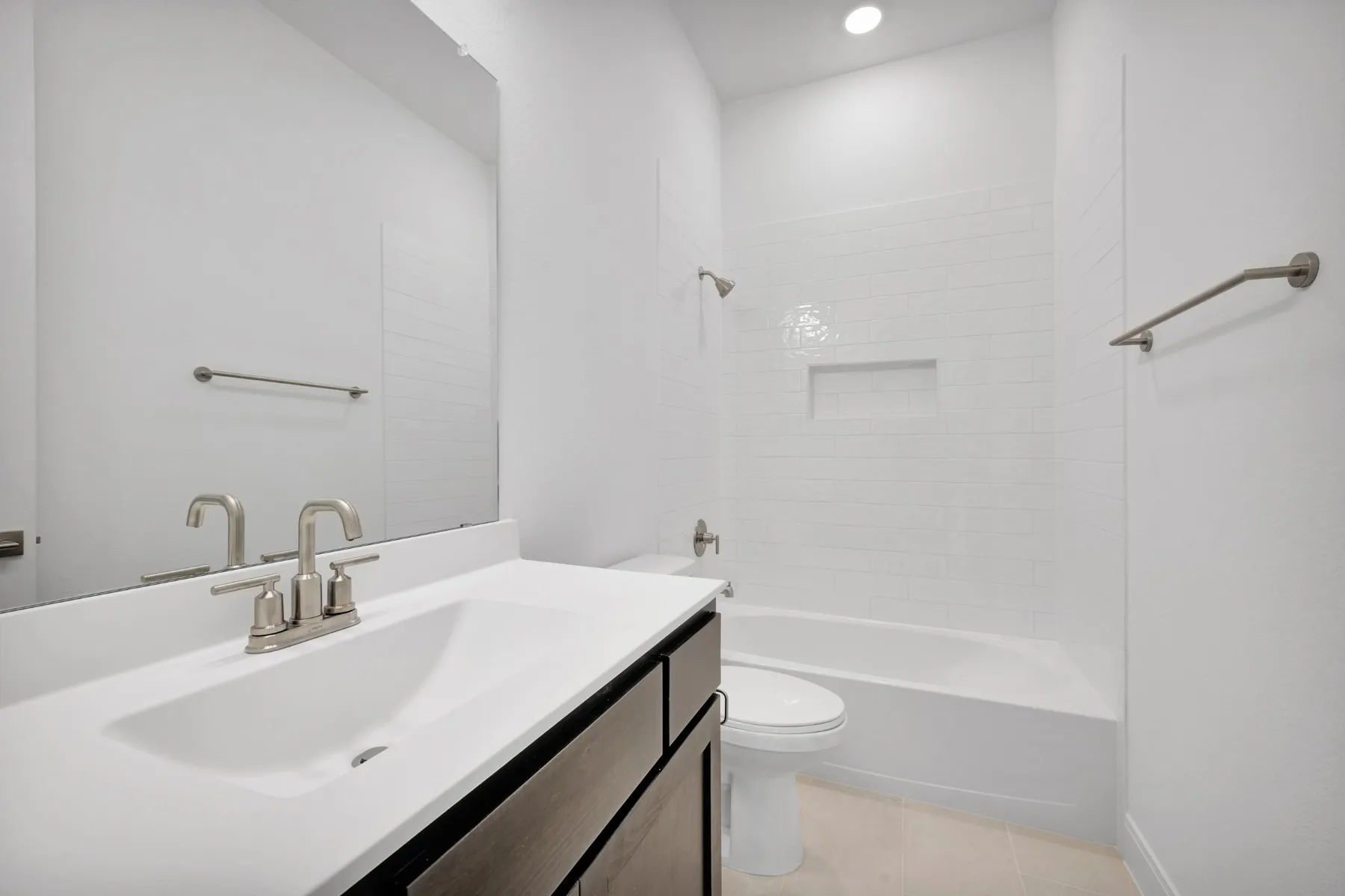 Full bathroom featuring vanity,  shower combination, light tile patterned flooring, and recessed lighting